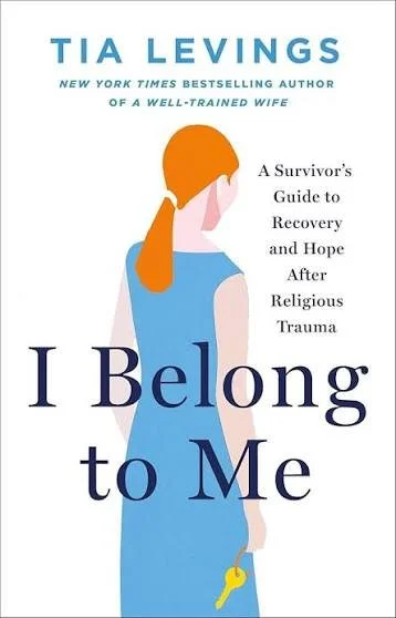 Book cover titled "I Belong to Me" by Tia Livings, featuring an illustration of a woman with red hair, wearing a blue sleeveless dress, holding a yellow key.