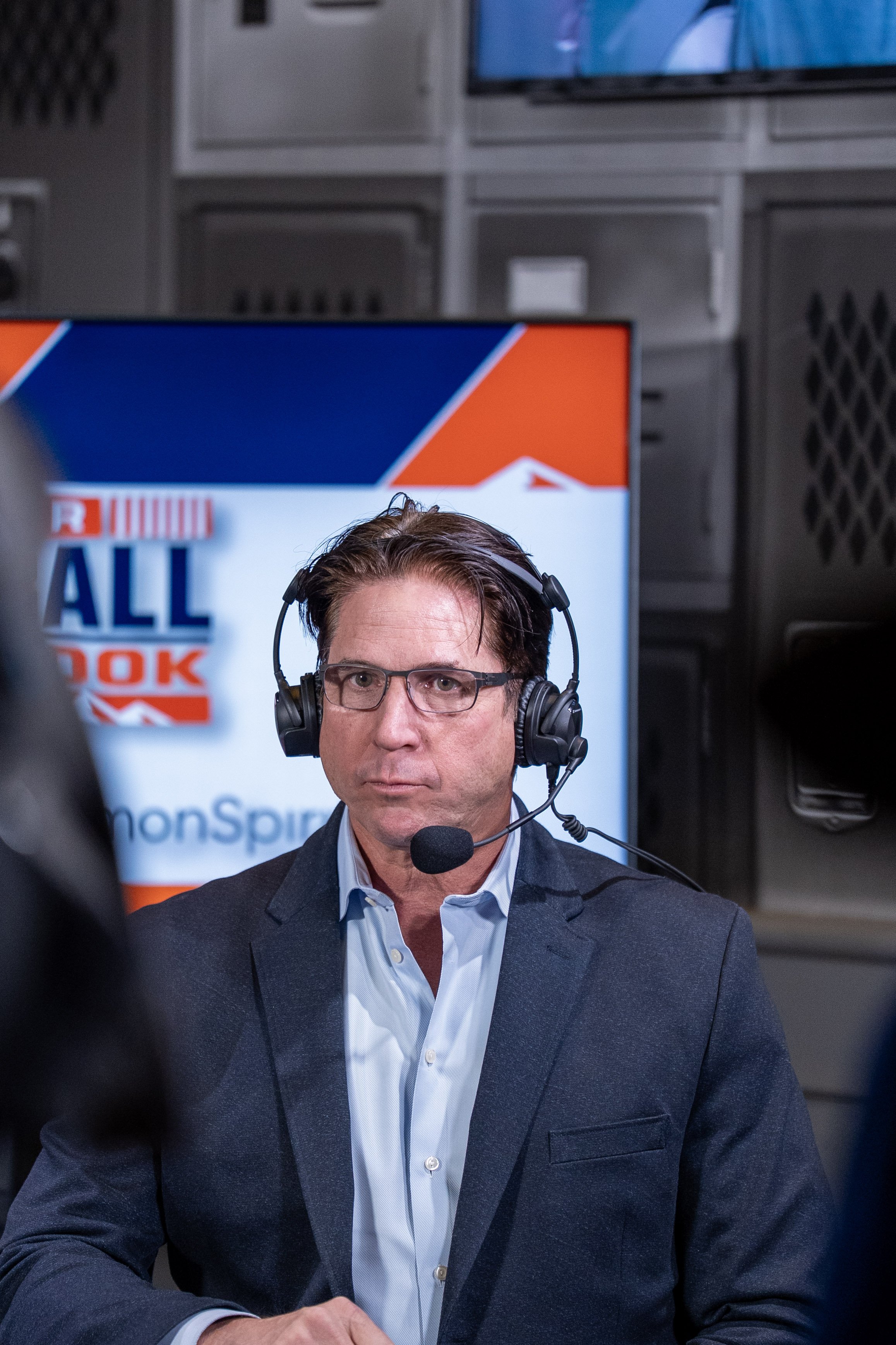 Denver legend Ed McCaffrey joins host Arran Andersen on stage for Denver Football Playbook LIVE.