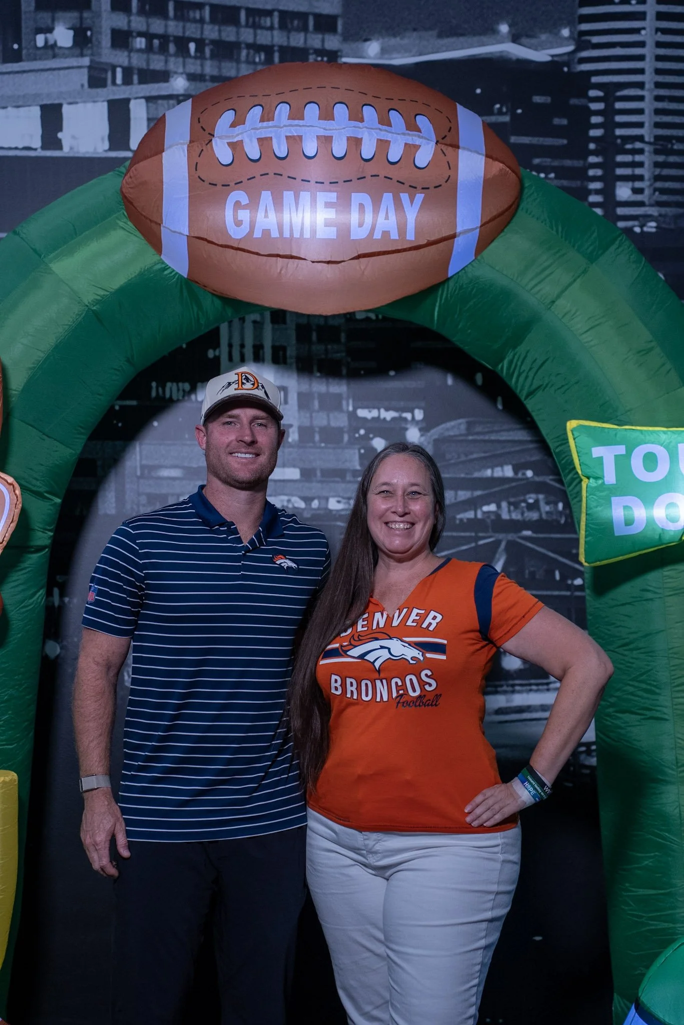 A fan meets Wil Lutz at the Denver Football Playbook meet and greet at Dave & Buster's Westminster