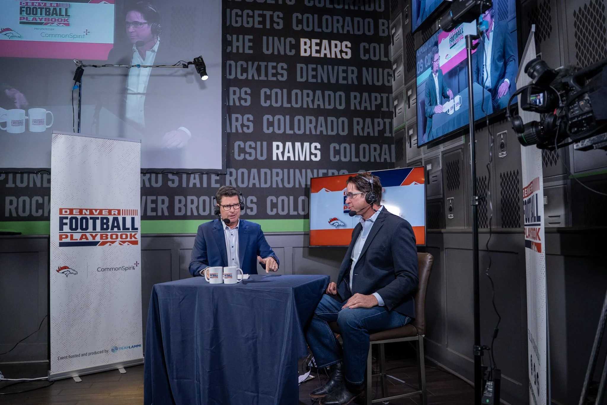 Ed McCaffrey speaks with Arran Andersen during a live taping of Denver Football Playbook at Dave & Buster’s Denver.