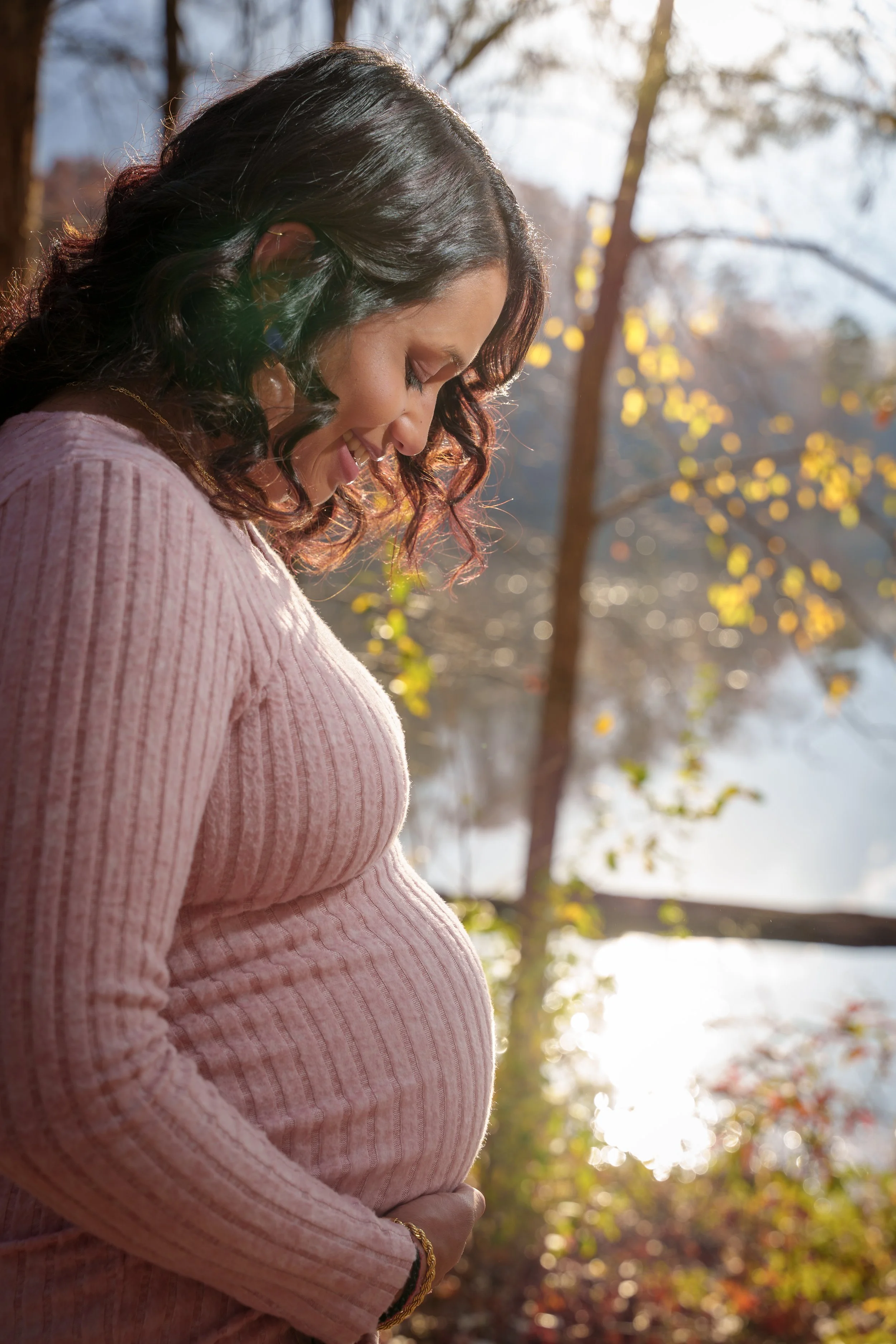 Expecting mother in golden hour rim light, maternity photographer Fort Mill SC