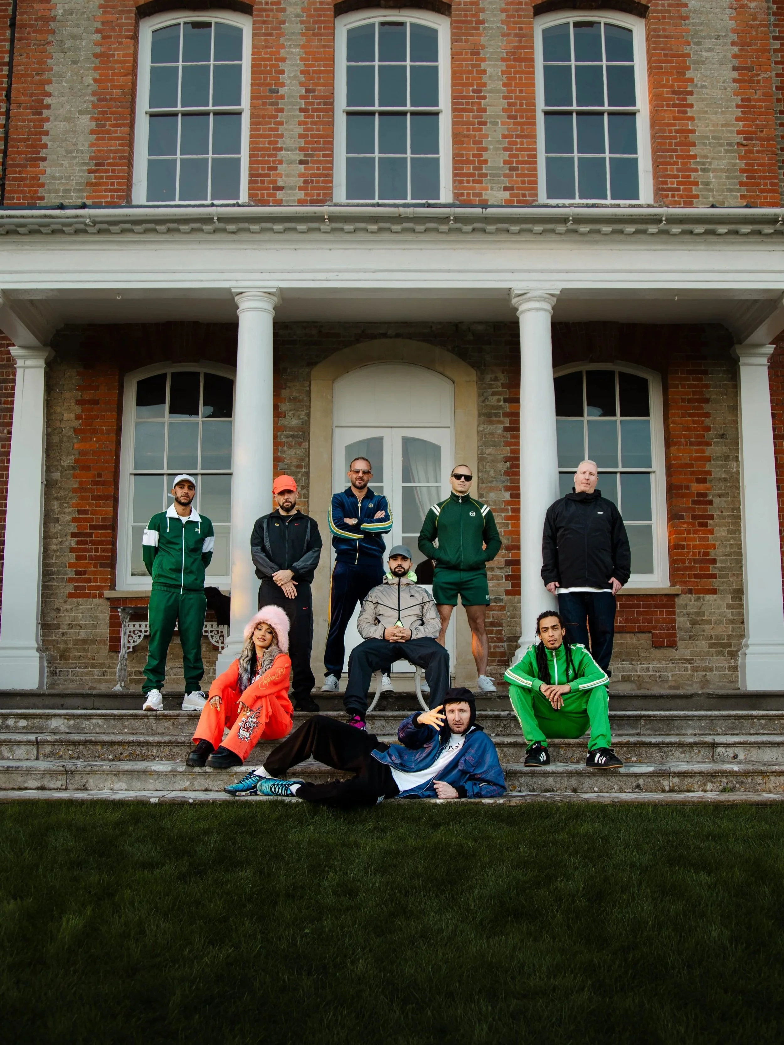 Group shot on the steps of a luxury manner for the Sigma single cover featuring Klaudia Keziah, Danny Bird, Natty D and Kurrupt FM

