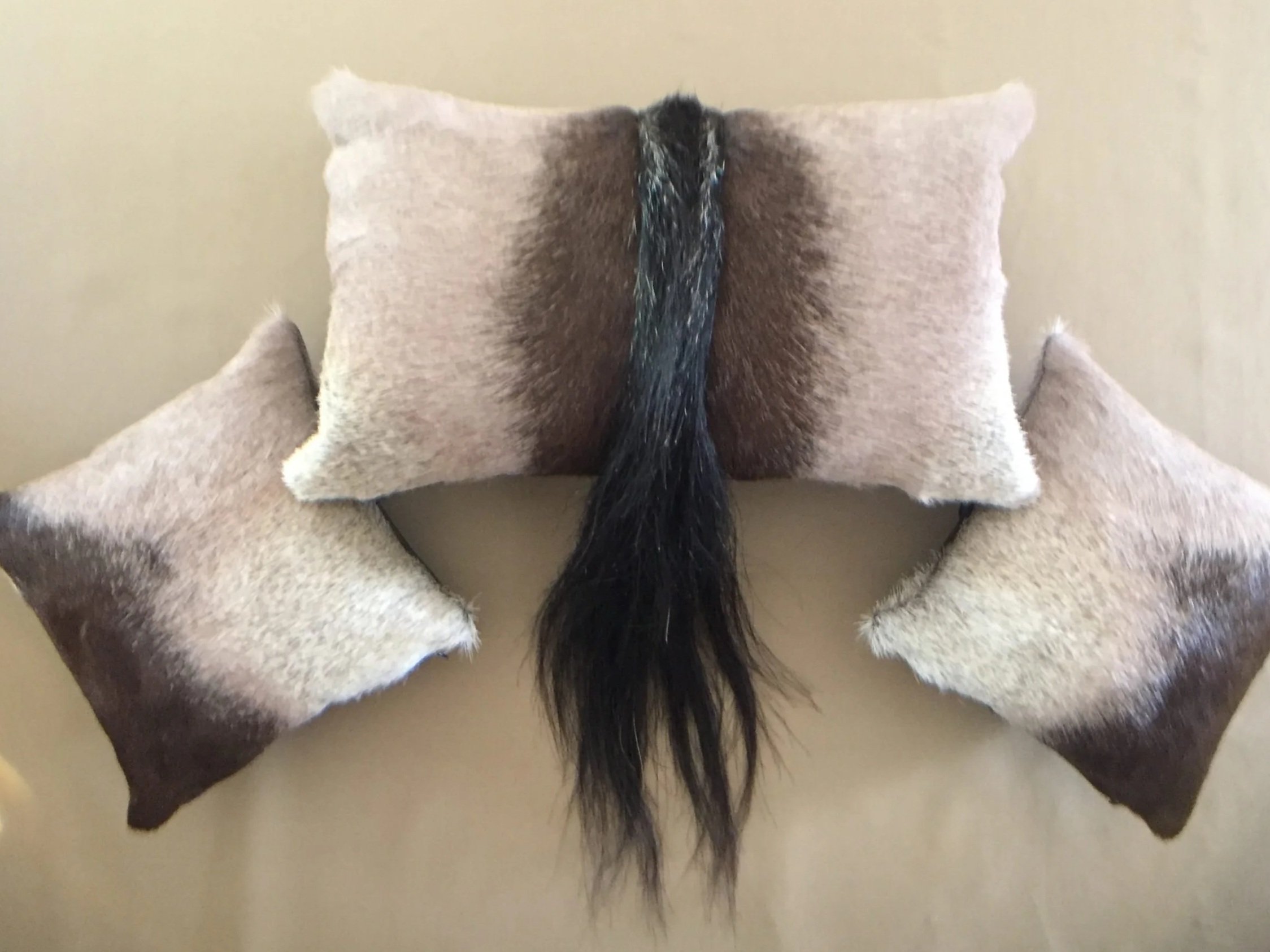 Custom pillows, showcasing a pillow with a tail. 