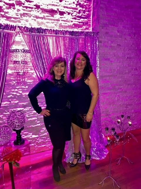 clara at event with client purple uplighting.JPG
