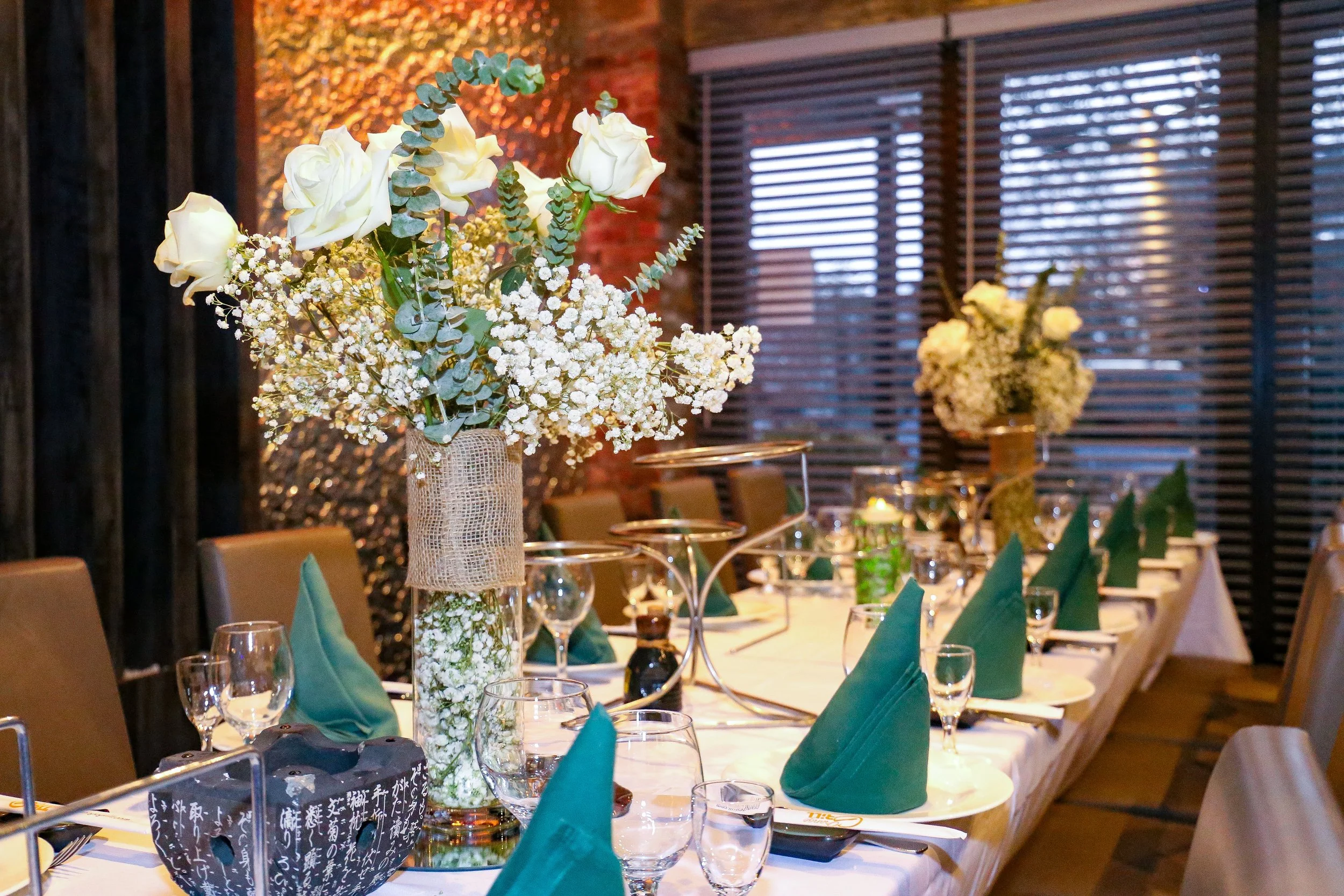 green and white table scape with flowers.JPEG