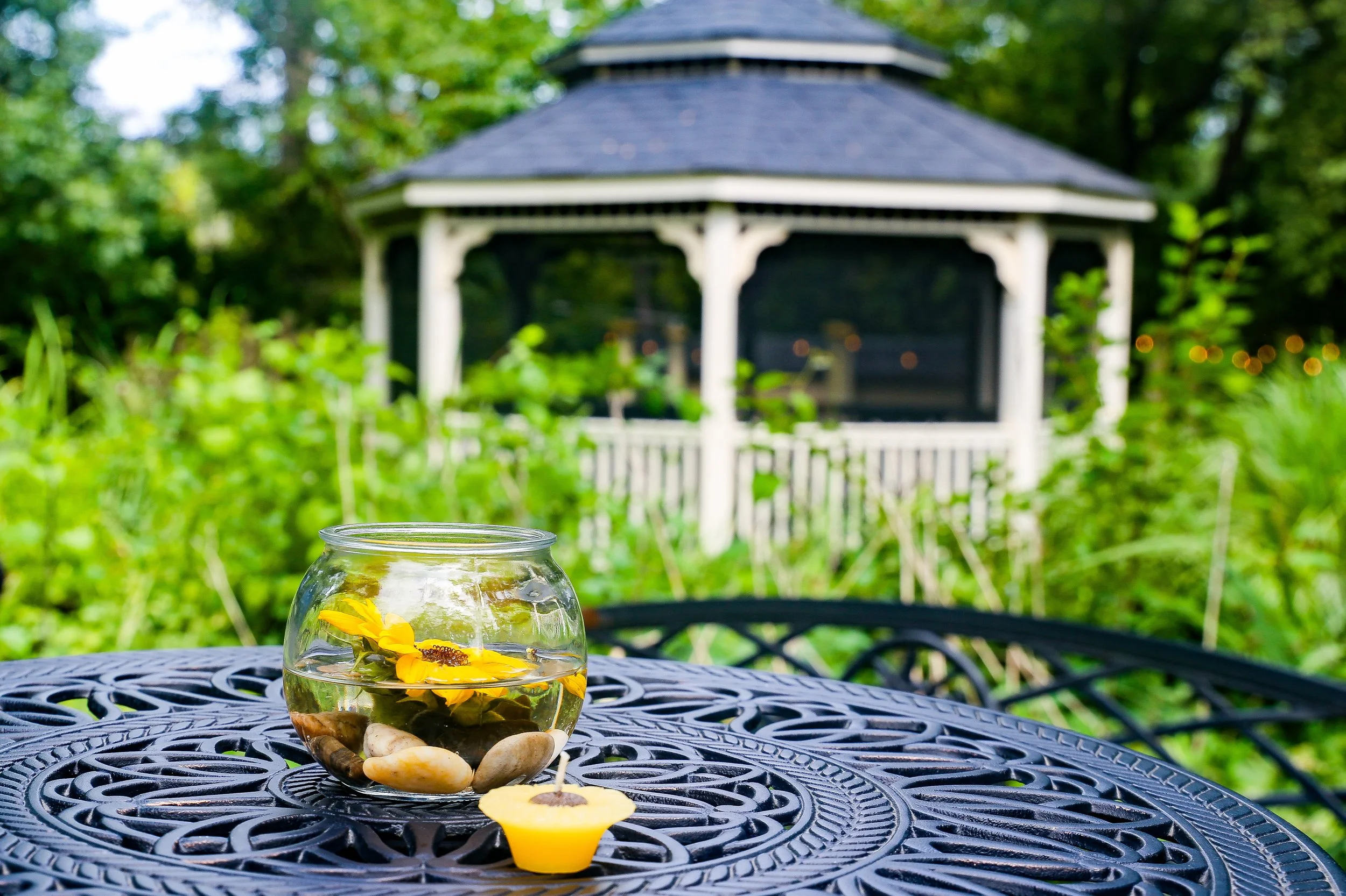 sunflowers in a glass vase with water.JPG