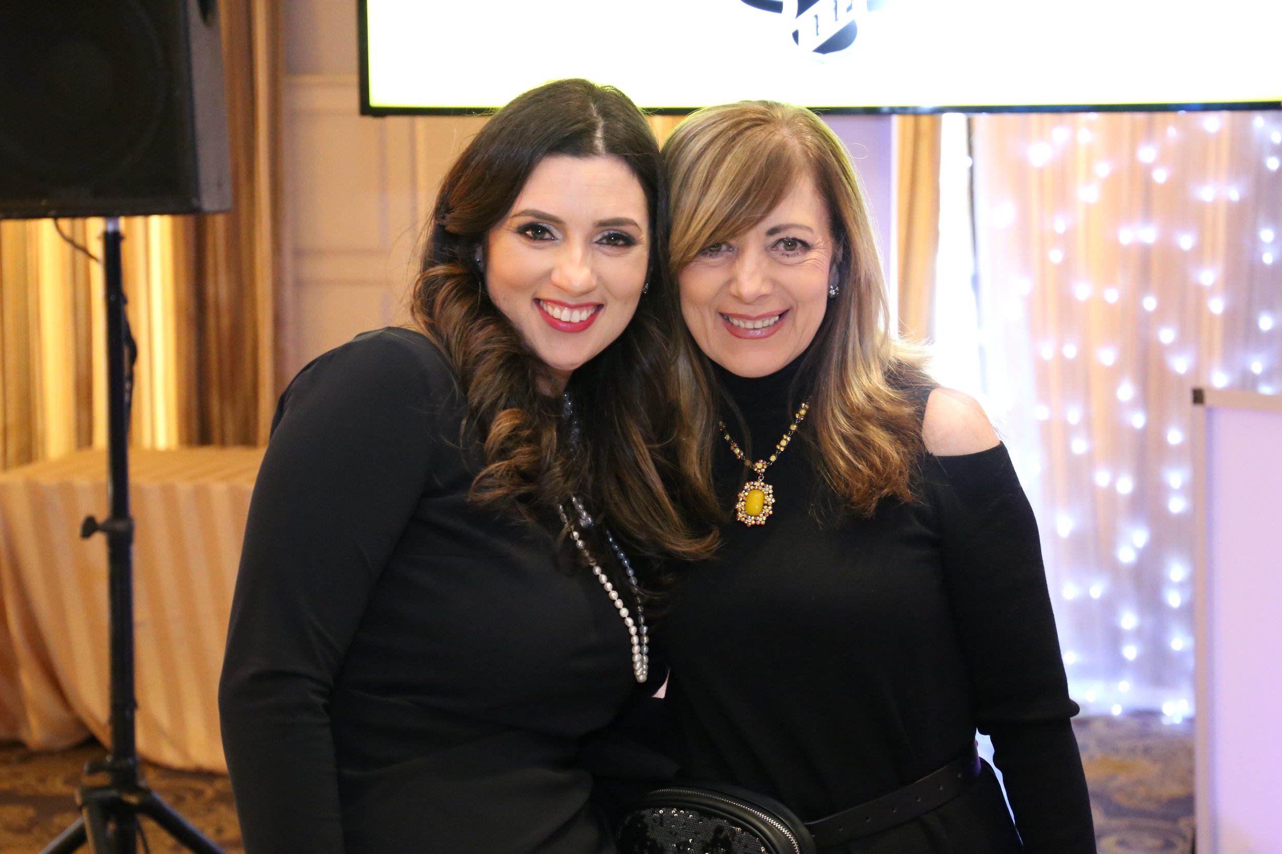 clara with client at corporate event.JPG