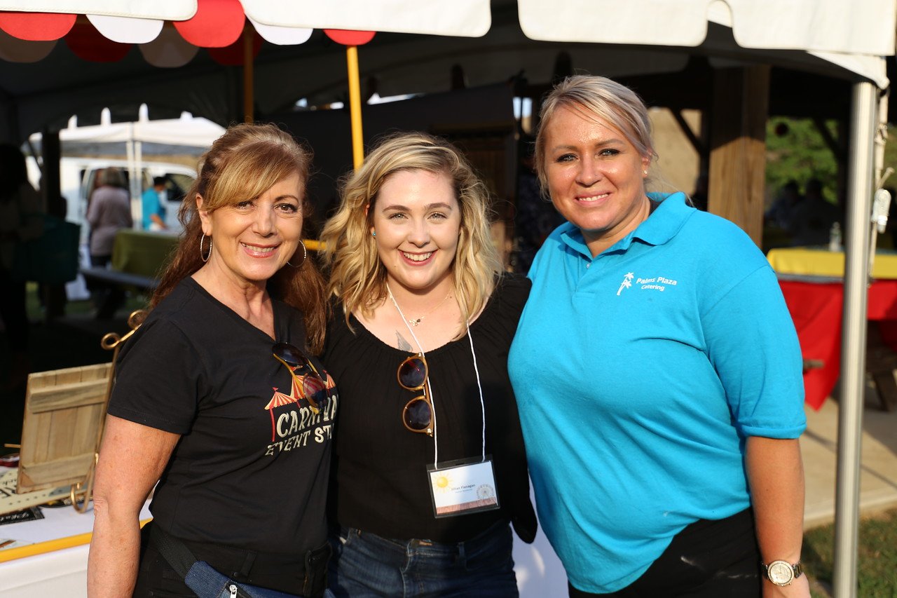 clara with clients at an event.JPG