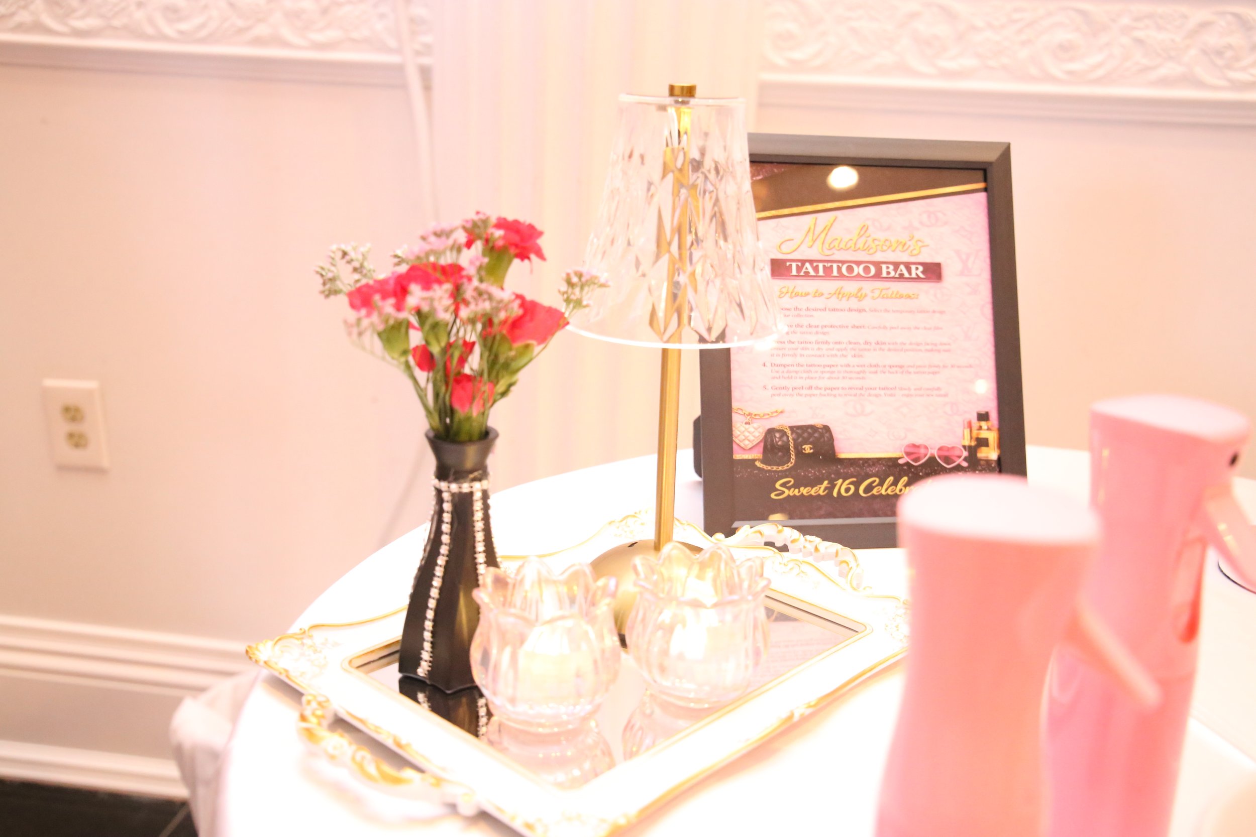 event table set-up with pink decor.JPG