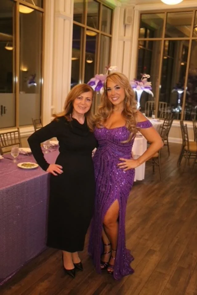 clara with client at event in purple dress.JPG