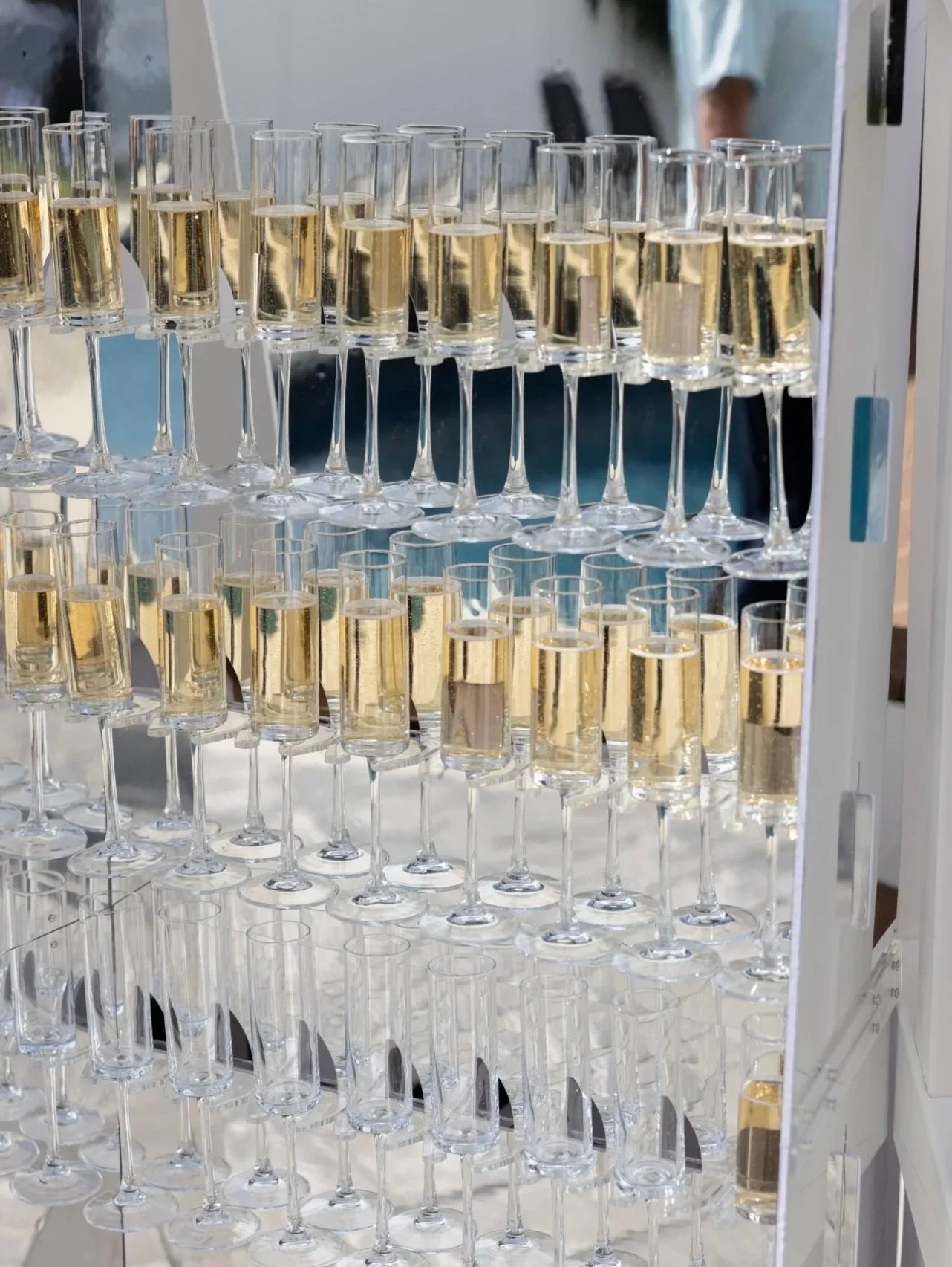 wall of champagne glasses