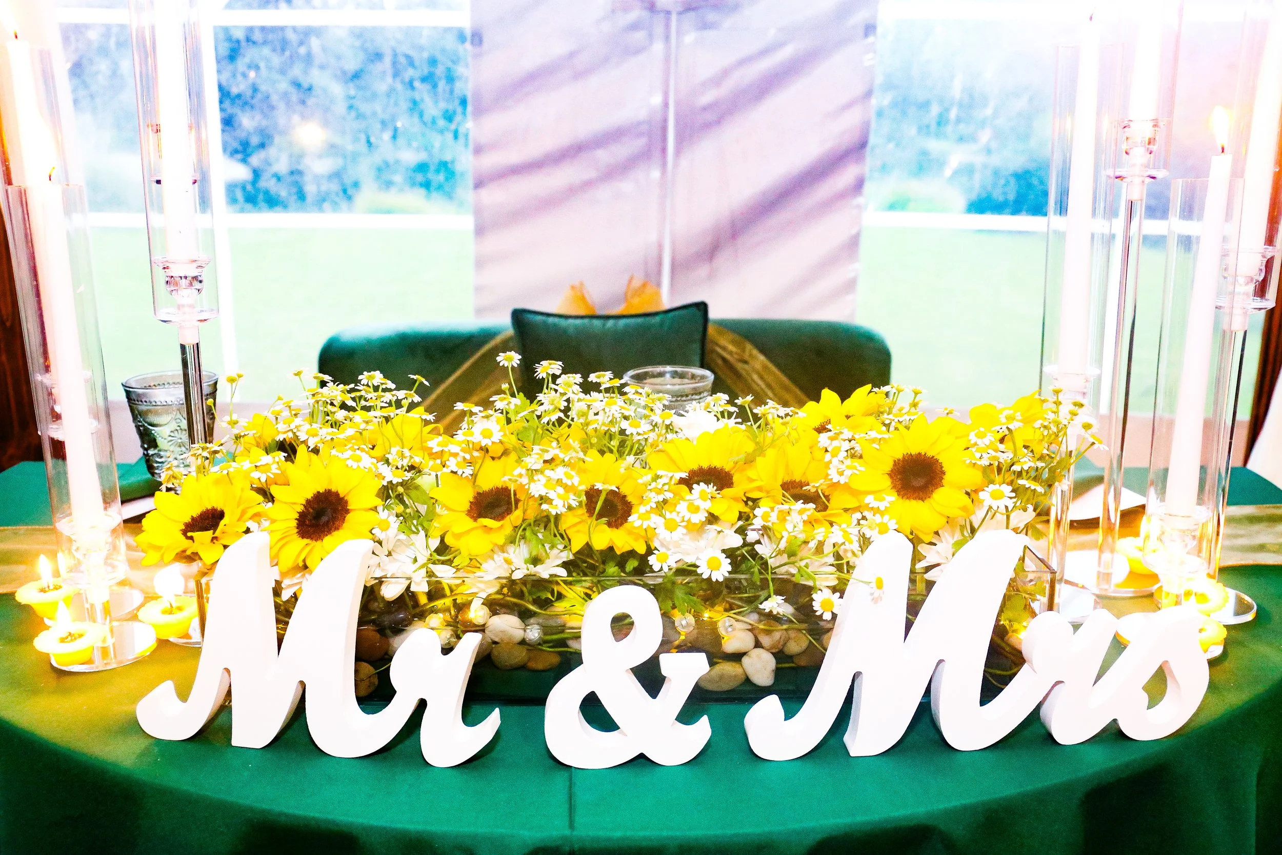 mr and mrs signs at wedding with sunflowers.JPG