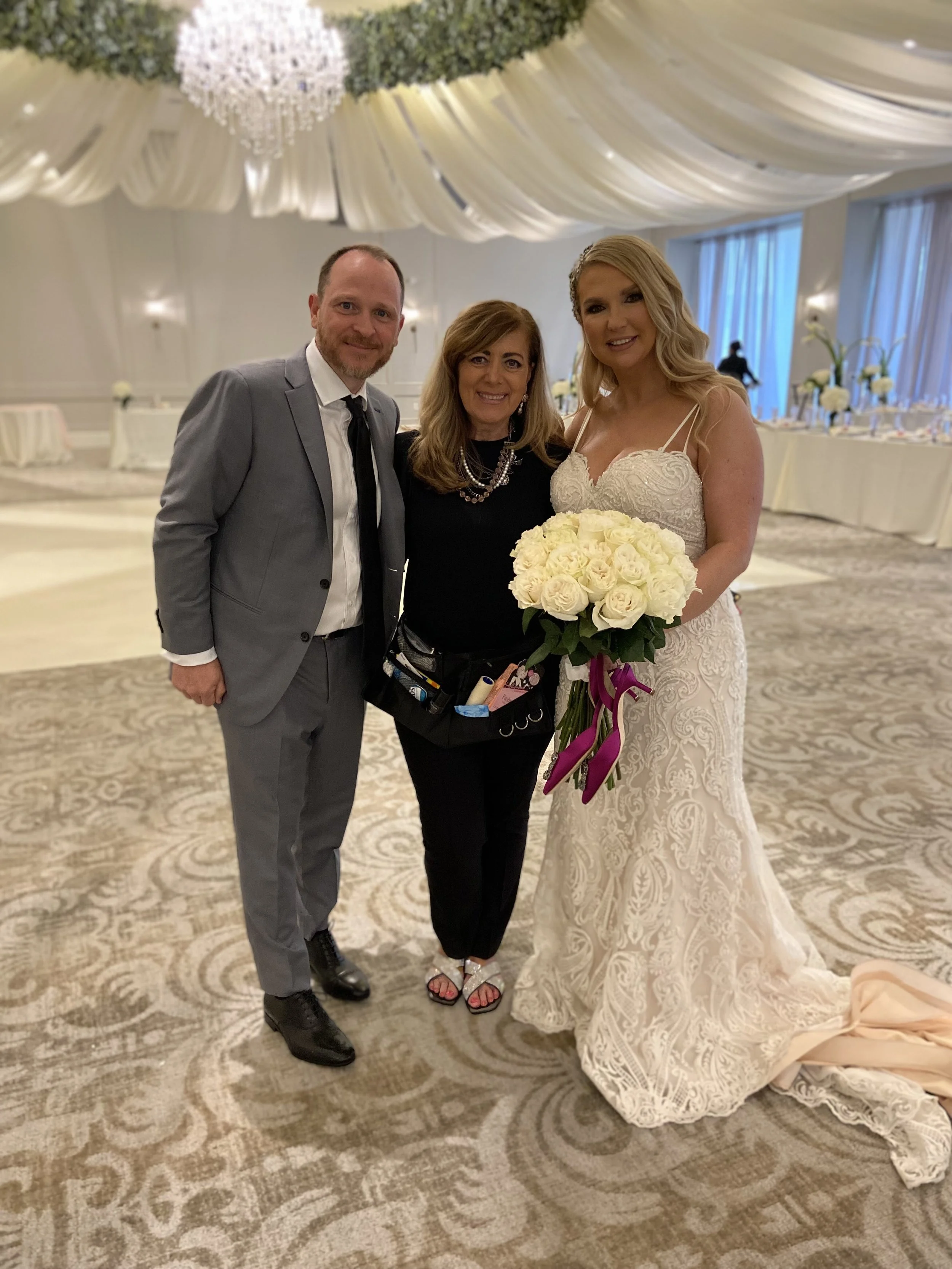 clara with wedding couple.JPG
