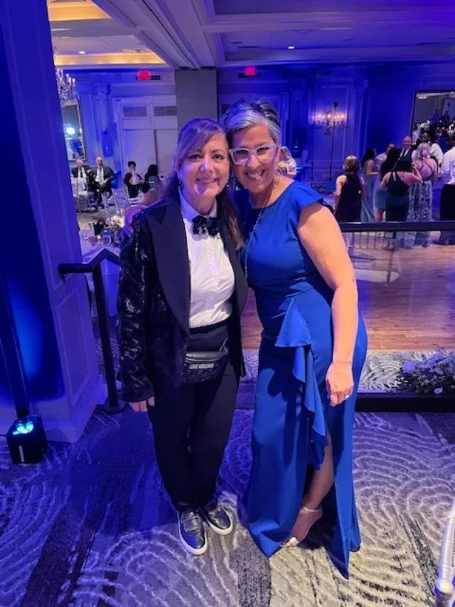 clara with client at event in blue gown.JPG