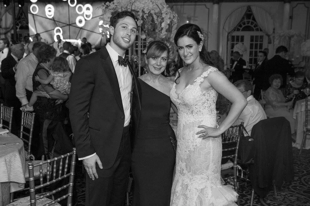 clara with bride and groom at wedding.JPG