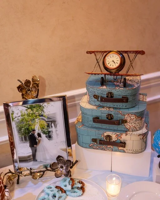 baby shower curated table with wedding photo.JPG