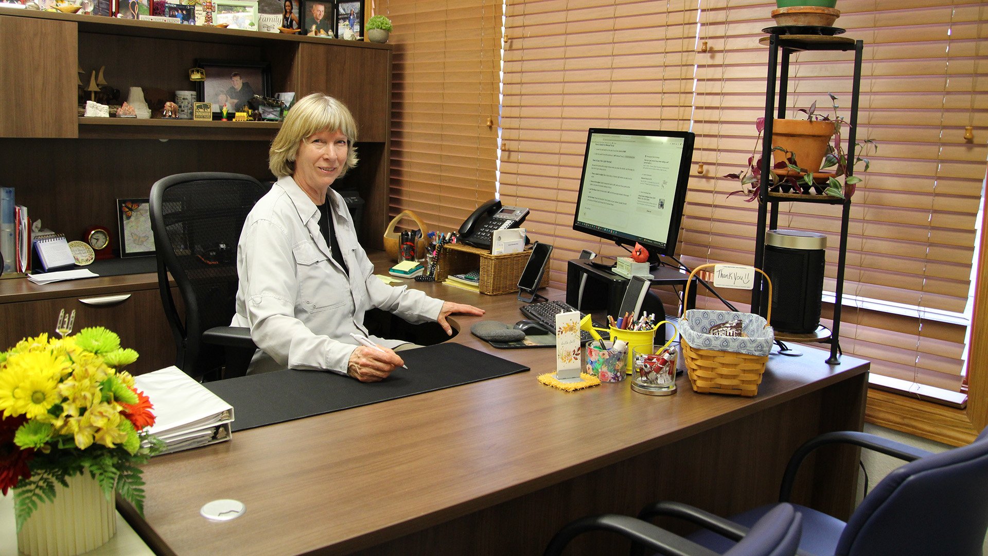 Connie Abernathy-Ness in the Abernathy-Ness Insurance Agency office in Rochester Minnesota