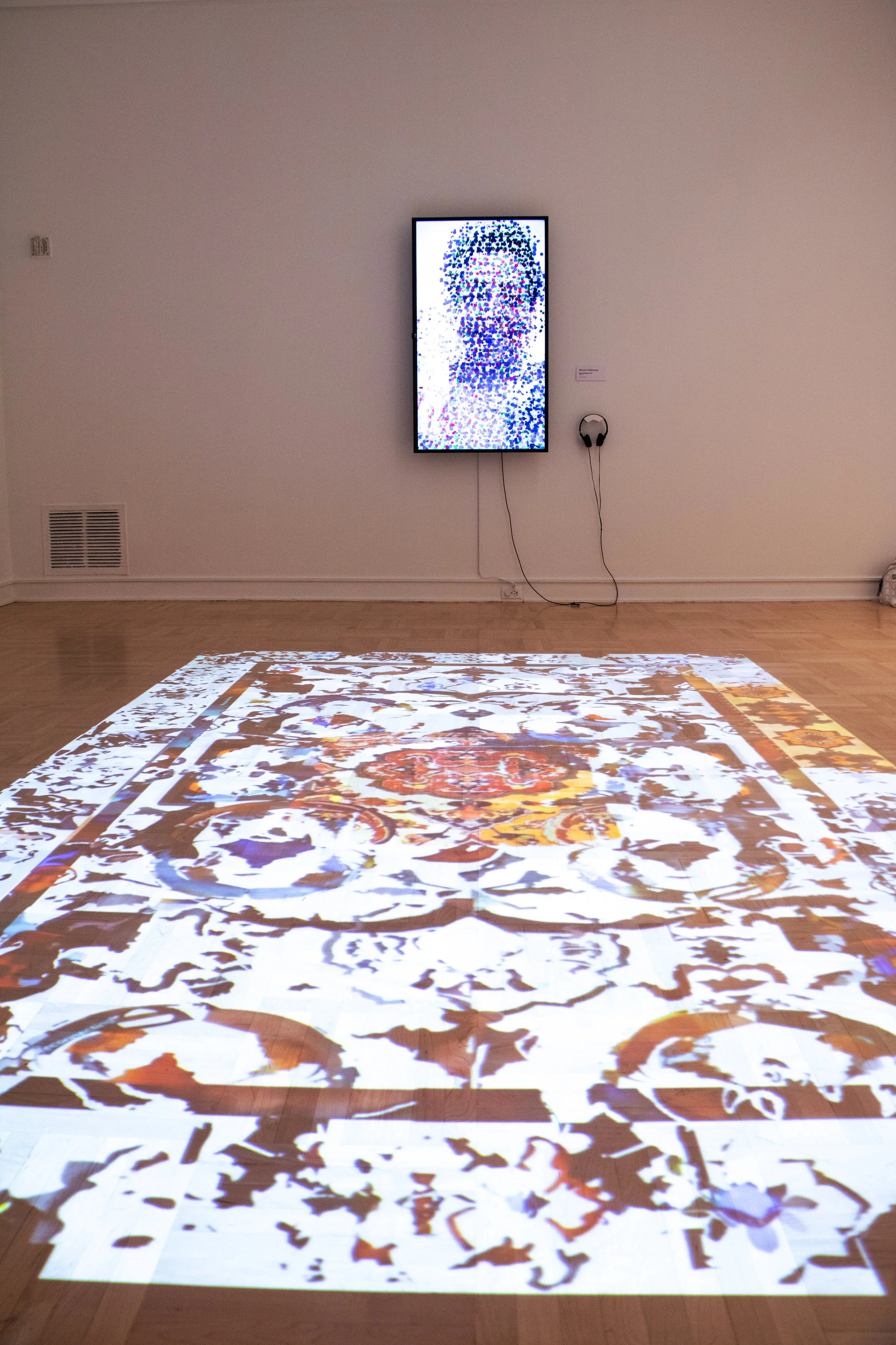 "Reconnecting" is the title of a series in which I question the role of technology and messaging applications as tools for bridging distances. In this work, I recorded a video conversation with my family simultaneously at both the origin and destinat