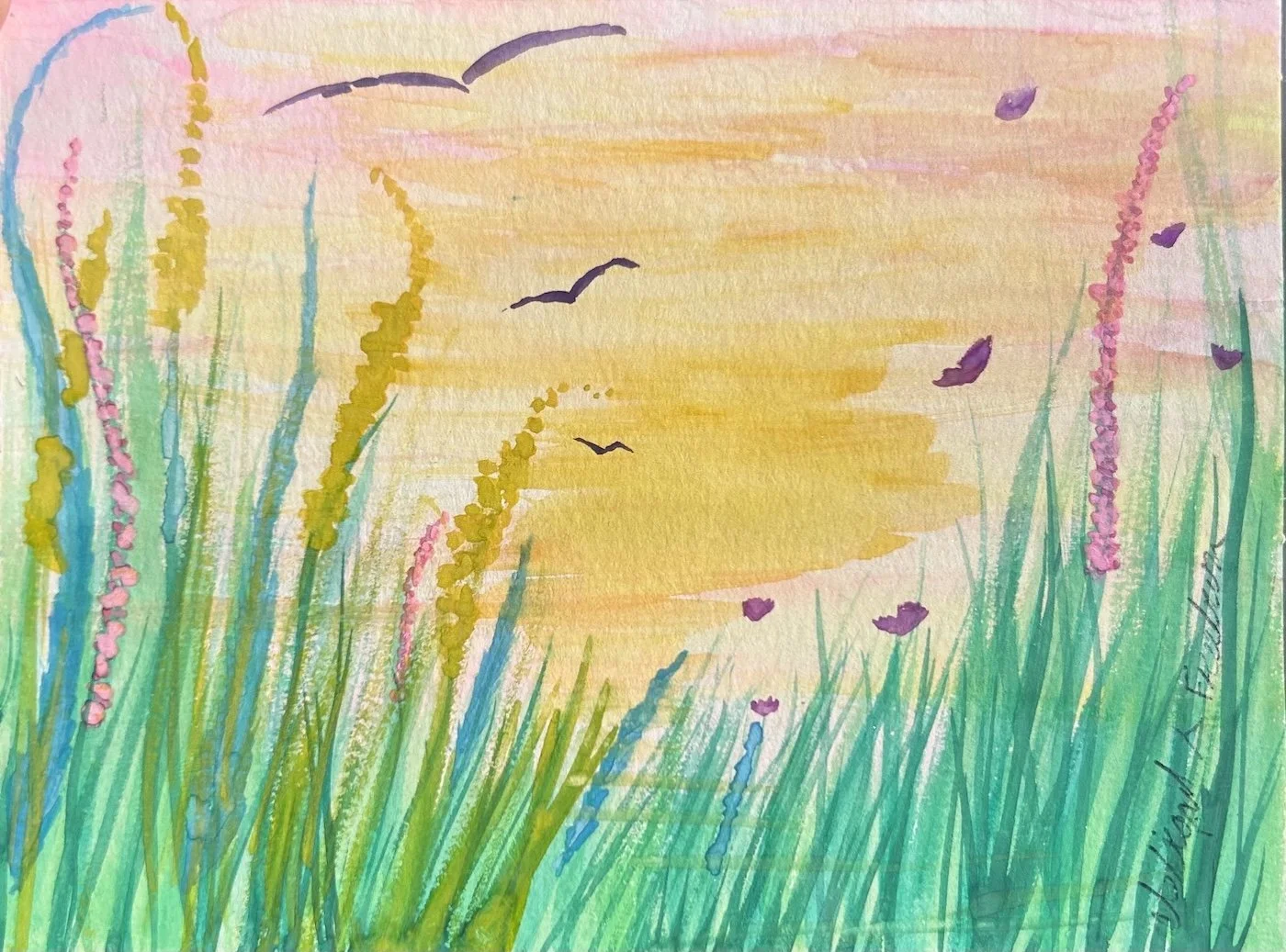 Watercolor painting of tall colorful grasses and wildflowers at sunset with birds flying in a yellow-orange sky.