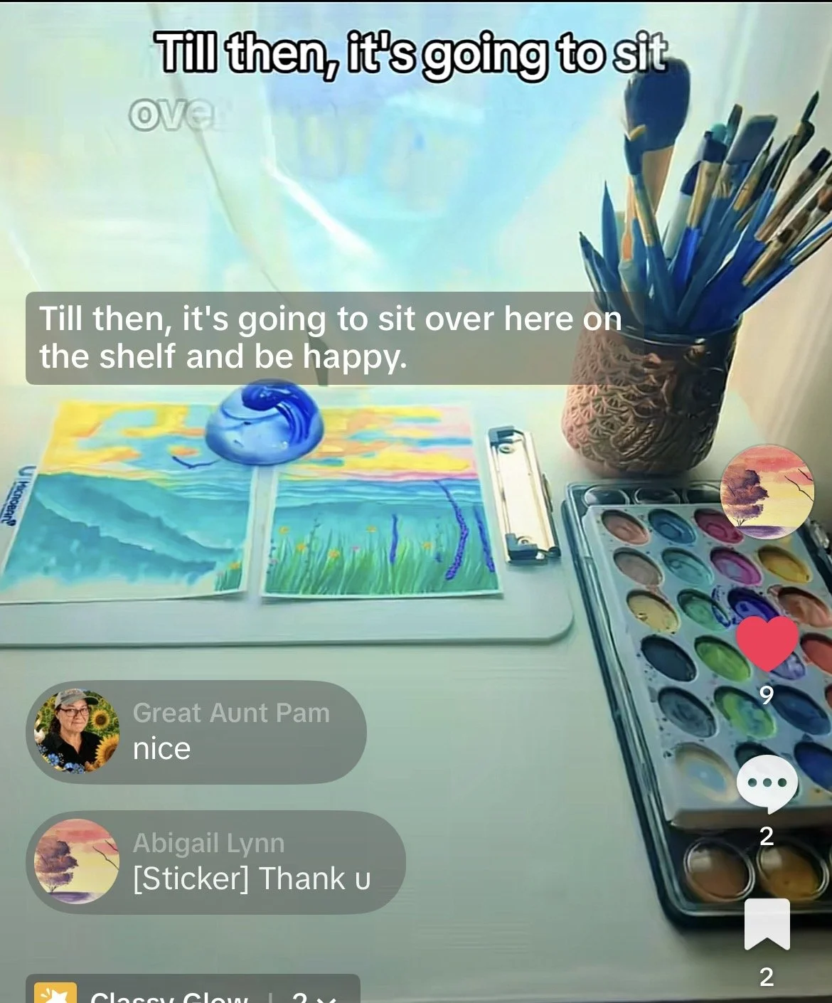 Image of a tick-tock clip of the artist showing their working space and a freshly completed painting.