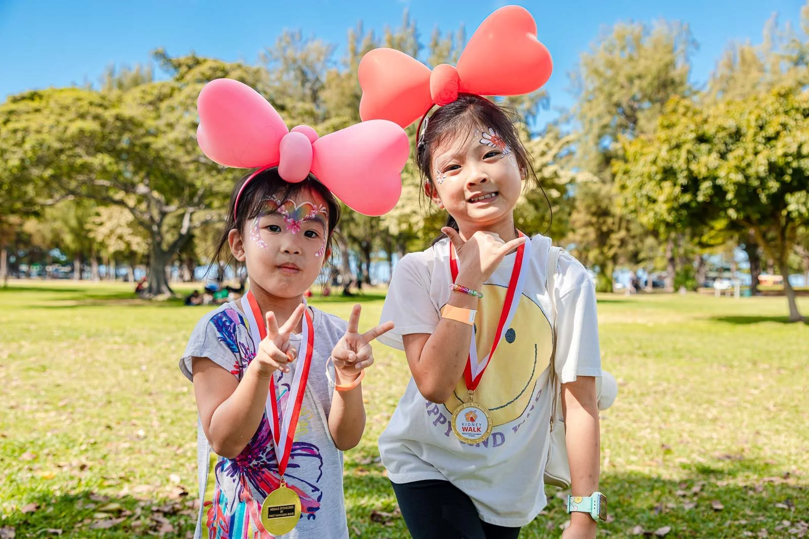 two young girls kidney walk event spokane park