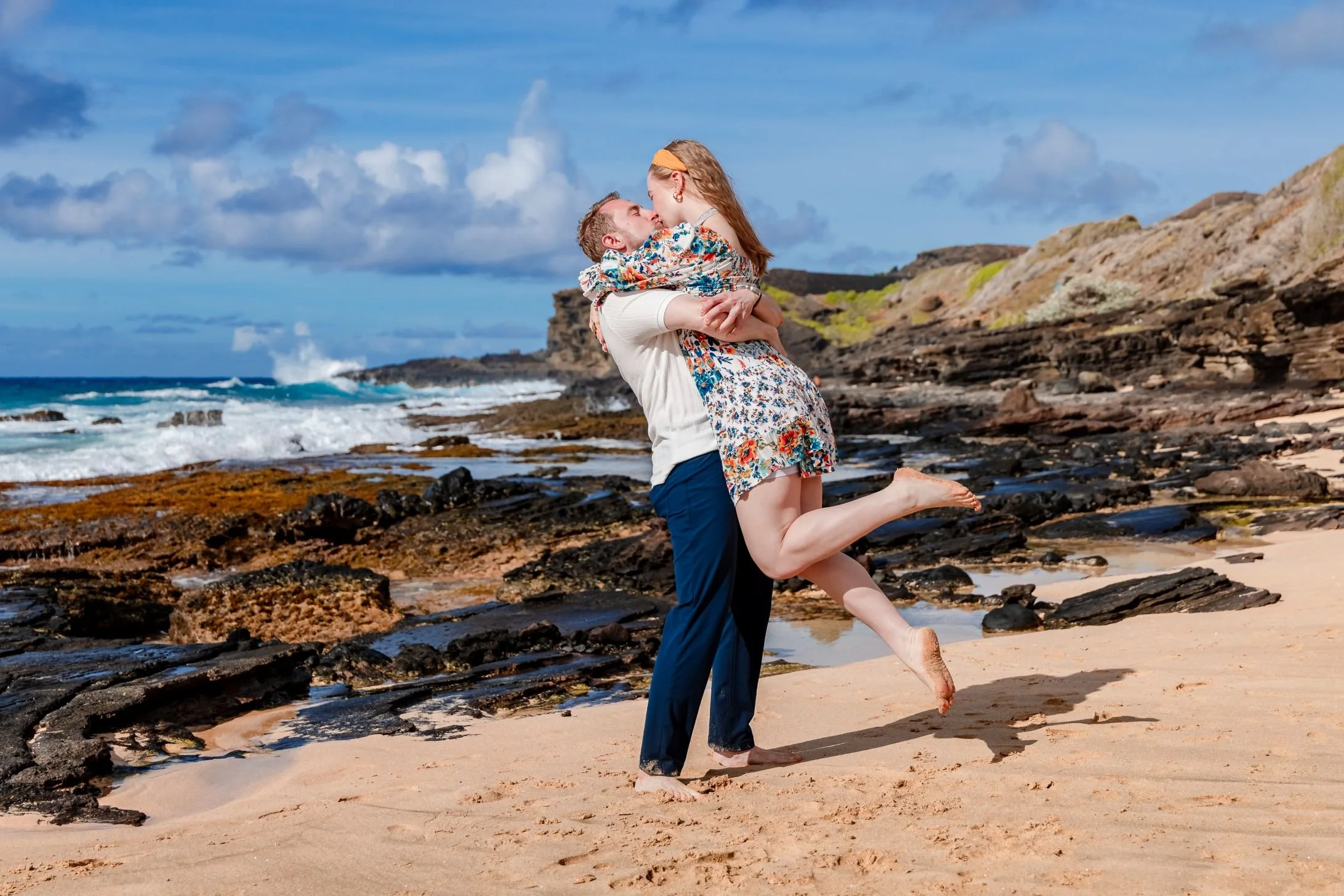 romantic couple kissing after engagement proposal