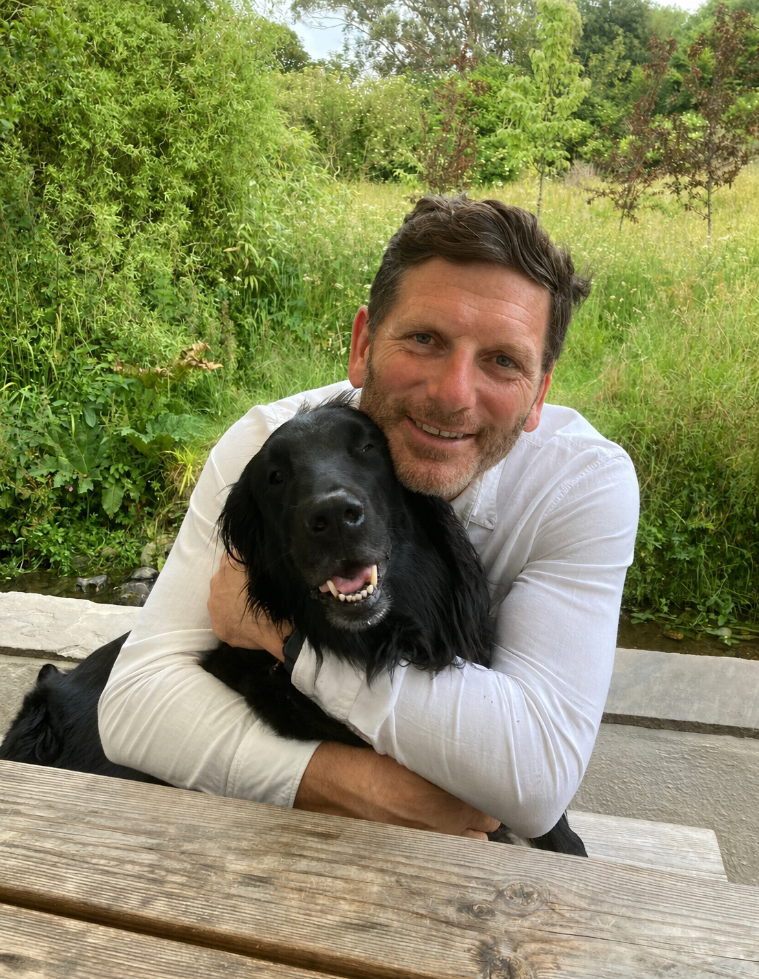 Richard Dixon, owner of Ferring Pressure Washing, with his dog