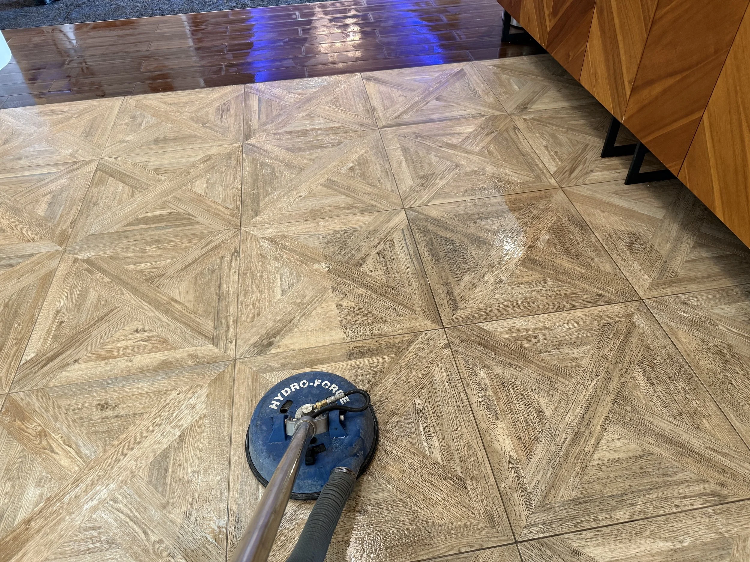 "Hydro-Force professional floor care equipment on a freshly cleaned restaurant tile and grout in the DFW cleaned by EZ PRO."
