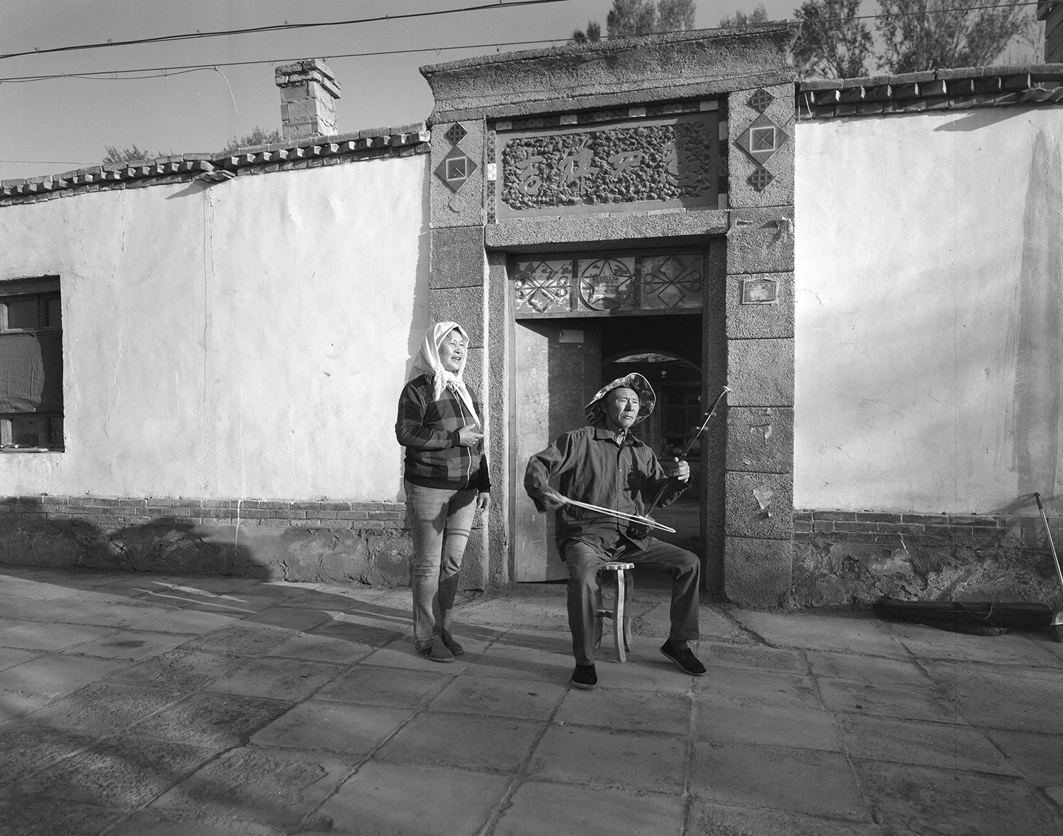 Rural musician, Guazhou, Gansu, 2023