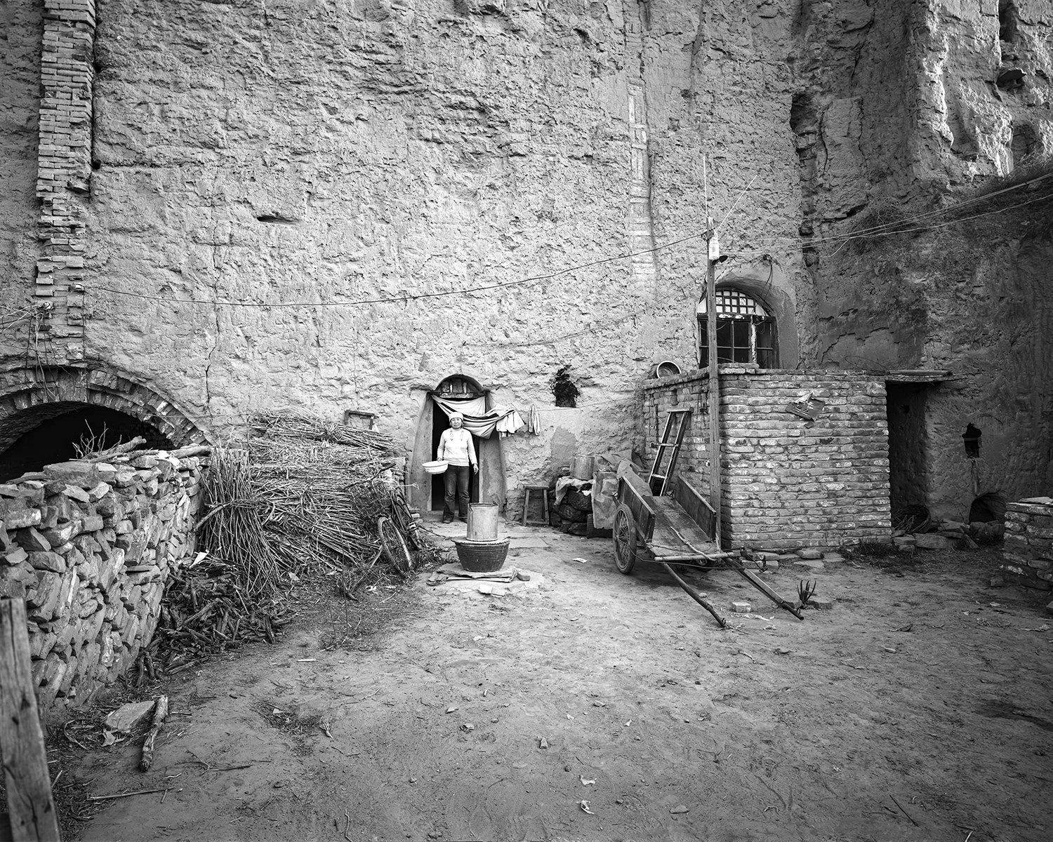A home against the ancient city wall, Laoyingbao, Pianguan, Shanxi, 2009