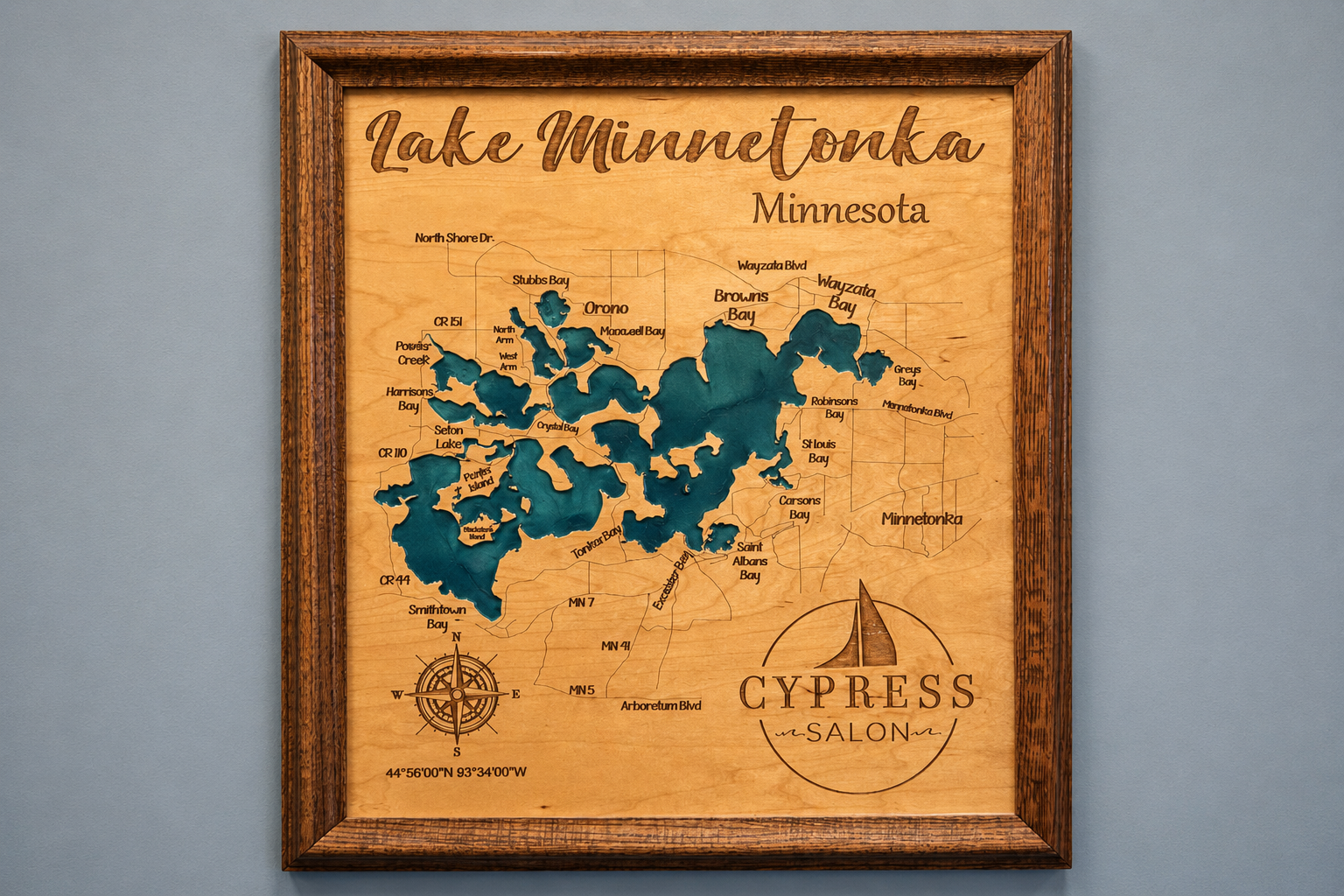 Wooden Lake Minnetonka map featuring the Cypress Salon name and sailboat logo