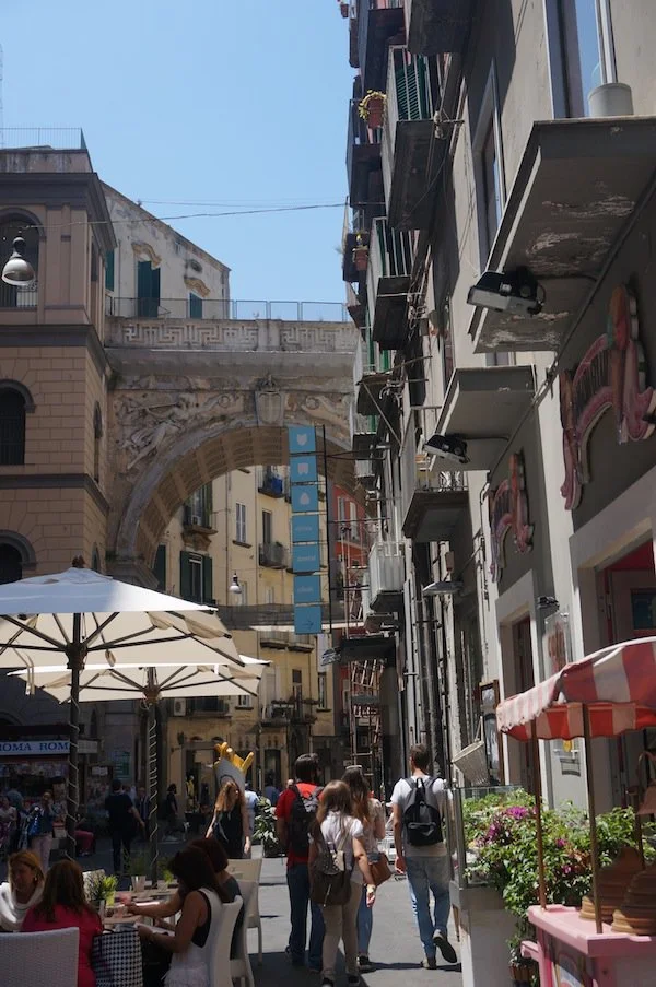 Of all the great cities Naples has suffered least at the hands of that destroyer of human monuments, the dark angel of development. Pliny himself, who once stood on a headland there to watch the great eruption of Vesuvius ‘shaped like a many-branchi…