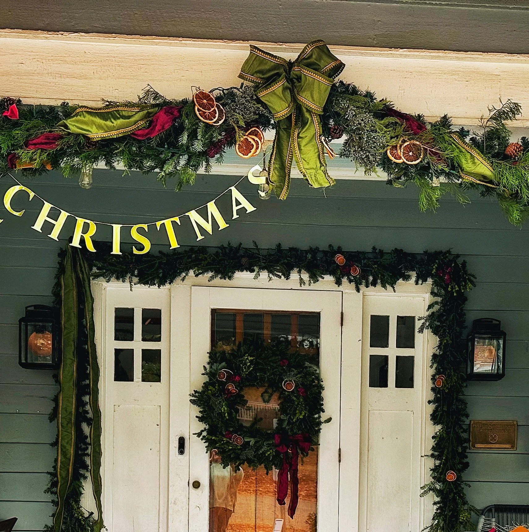 Front porch green bow.jpeg