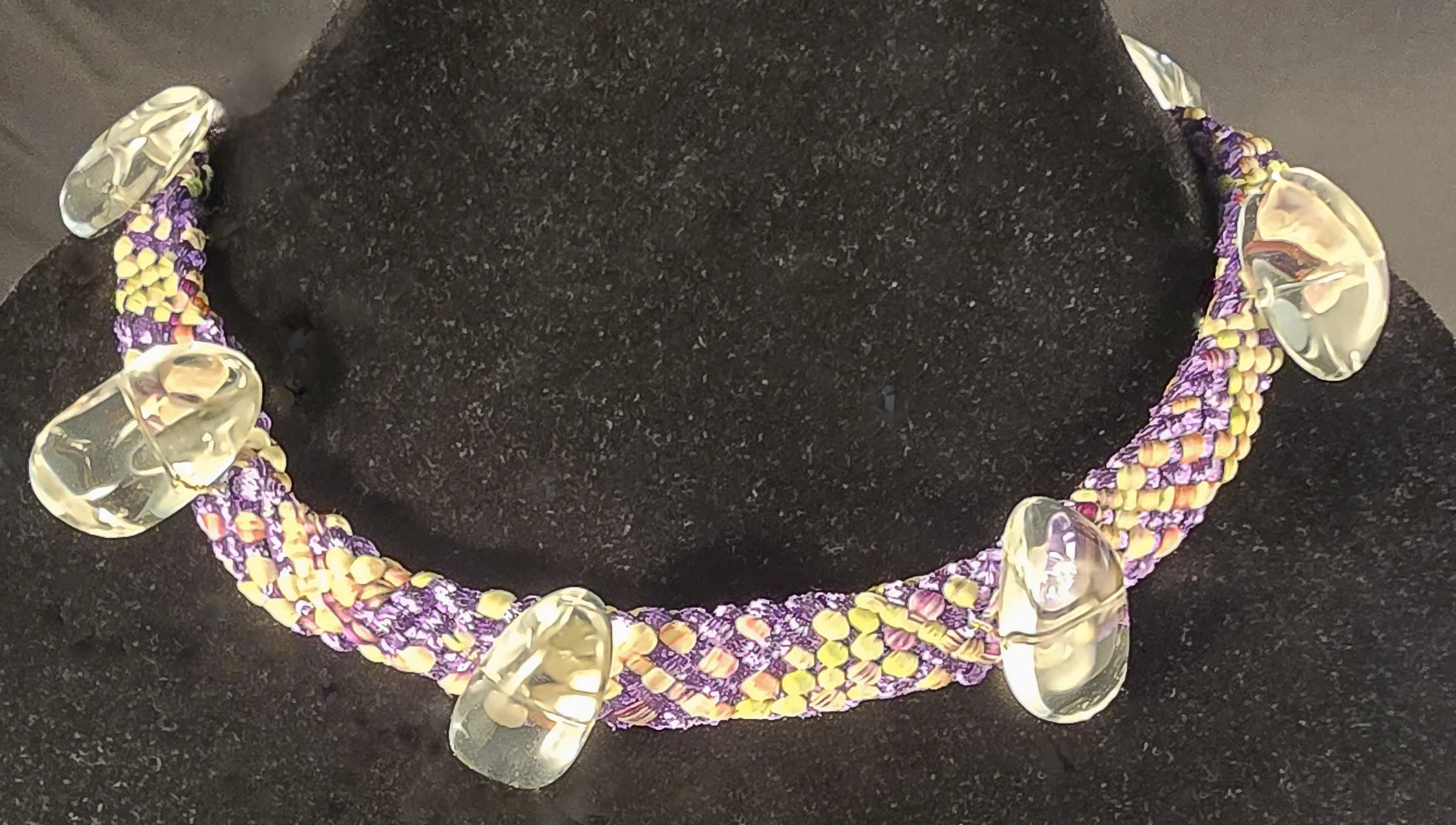 Oracle

Oracle is a one-of-one wearable work rooted in the ancient Japanese braiding practice of Kumihimo. The hollow braid is constructed on a marudai using Japanese threads hand-dipped in metallics, creating a form that carries both lightness and s