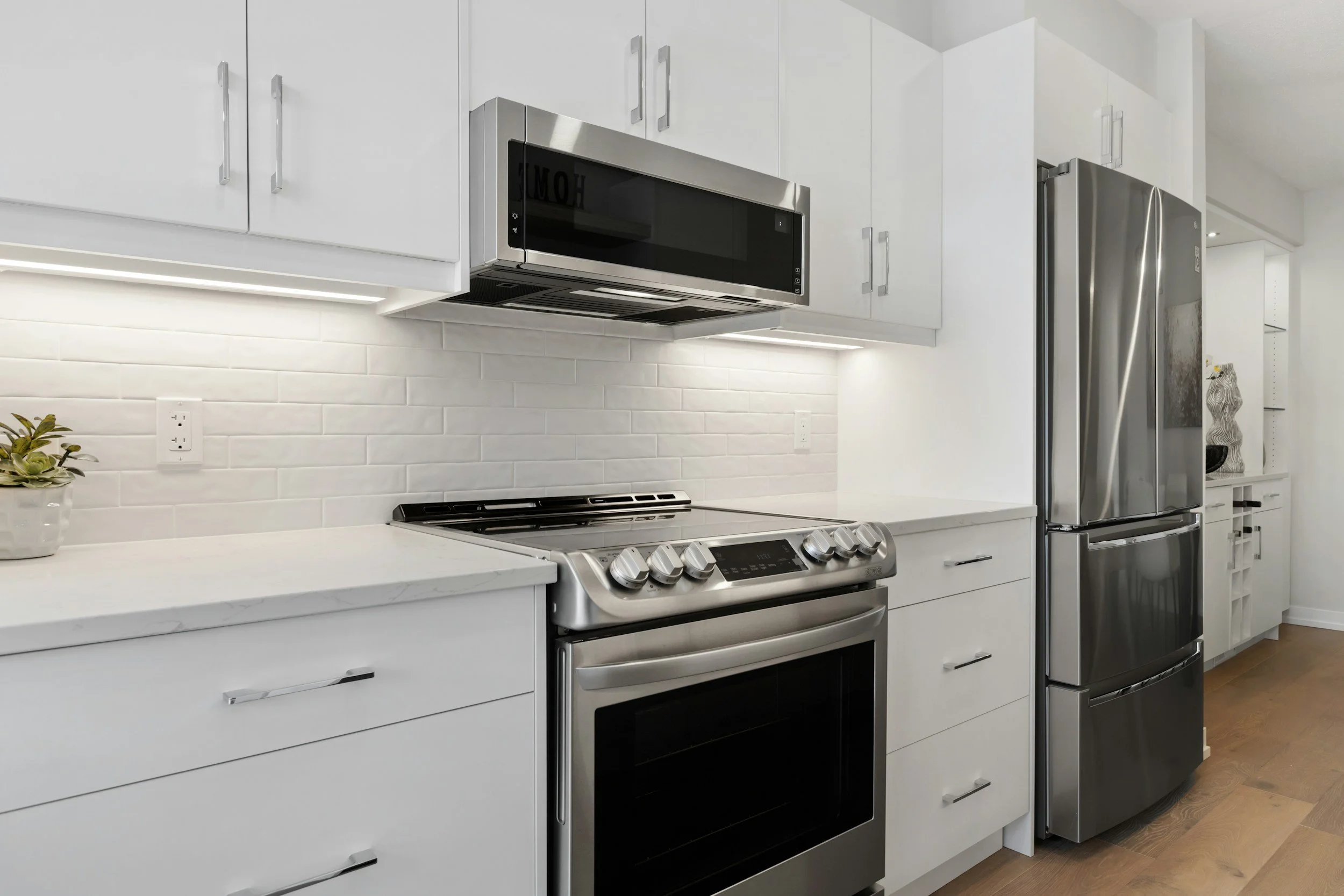 clean oven and refrigerator in the kitchen