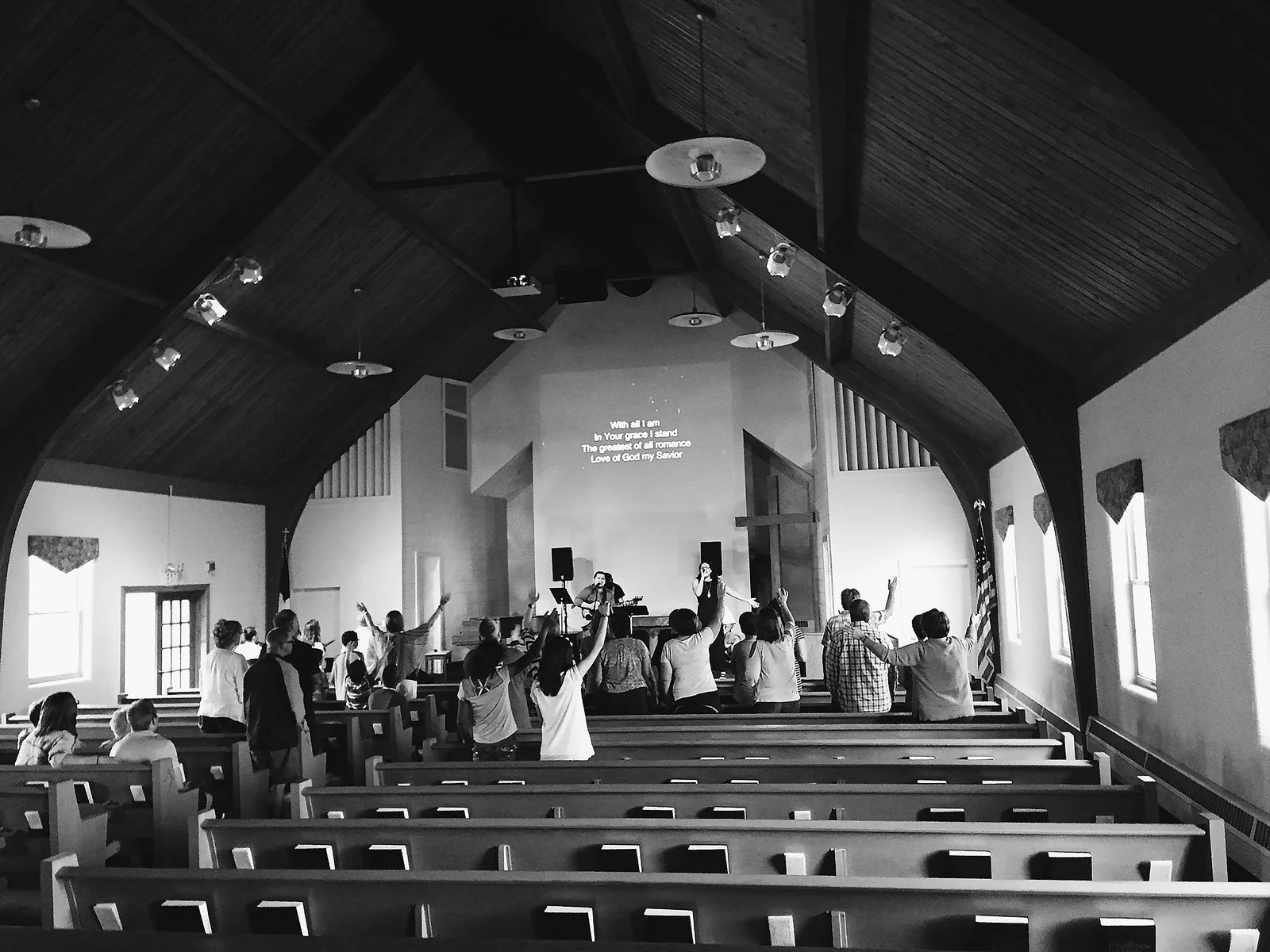 An early New Life Church worship gathering in a local church building