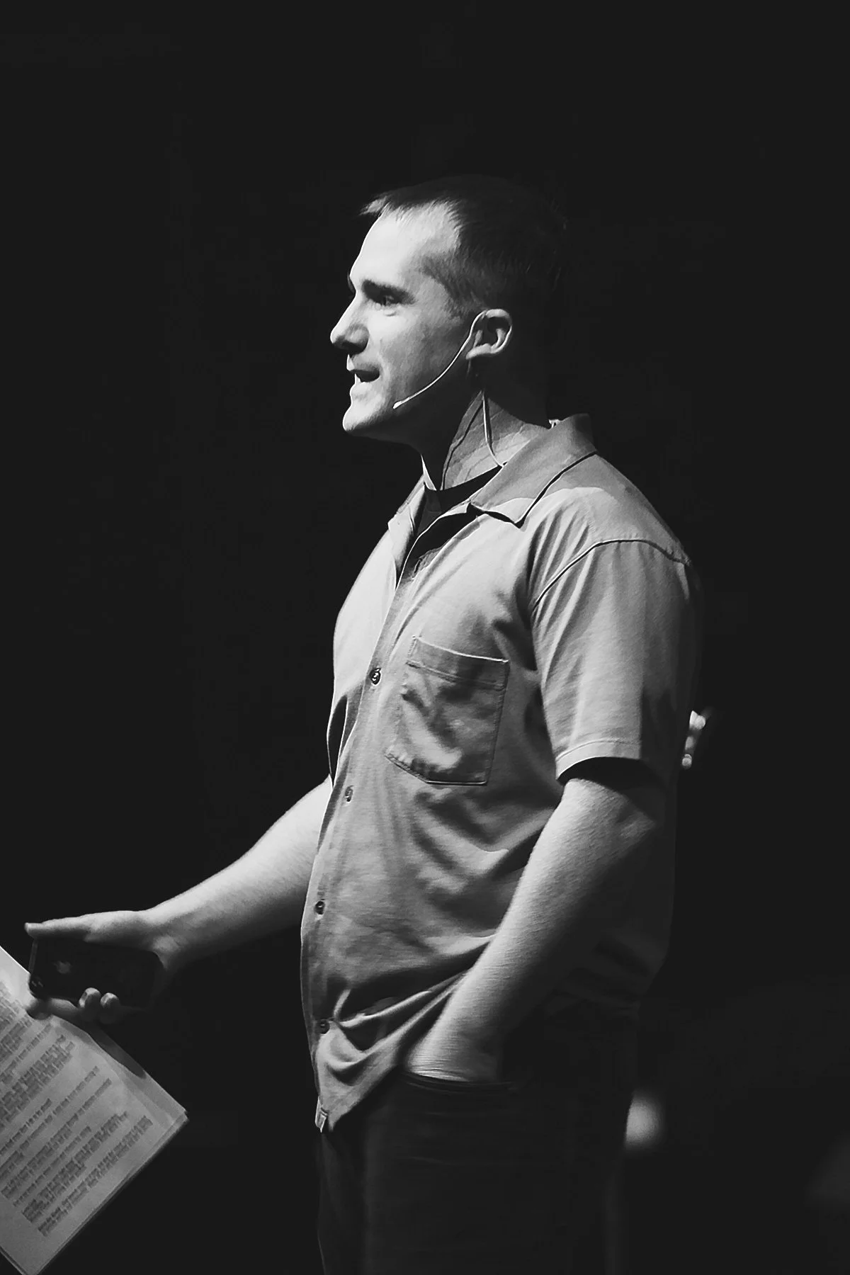 A pastor preaching during an early New Life Church gathering