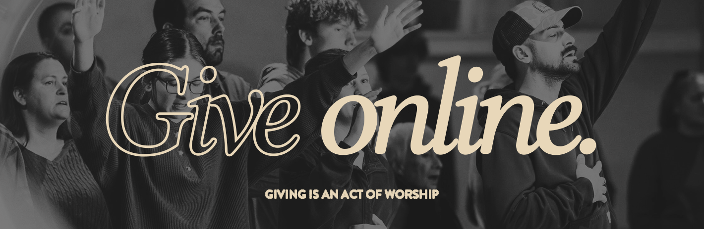 Group of people in worship with hands raised, with overlay text reading "Give online" and "Giving is an act of worship"