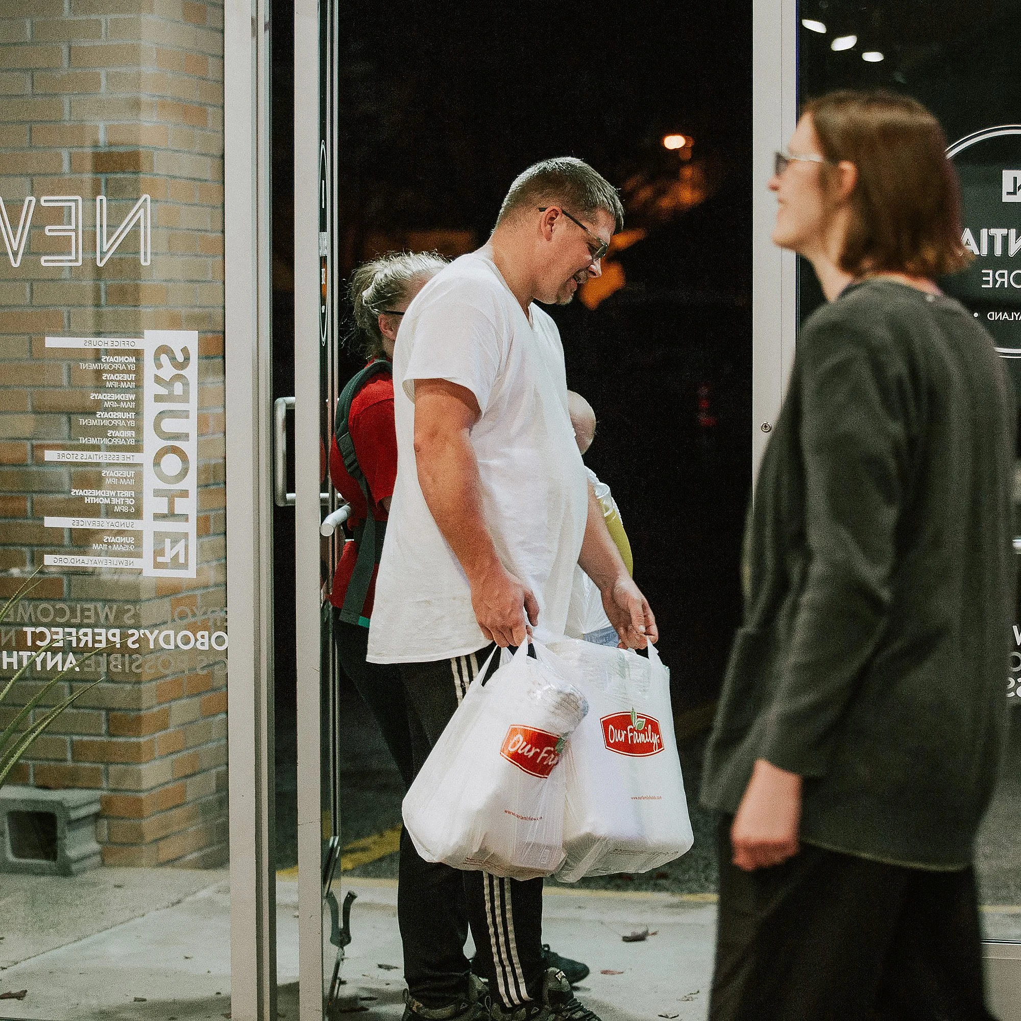 An Essentials Store member receiving free household products
