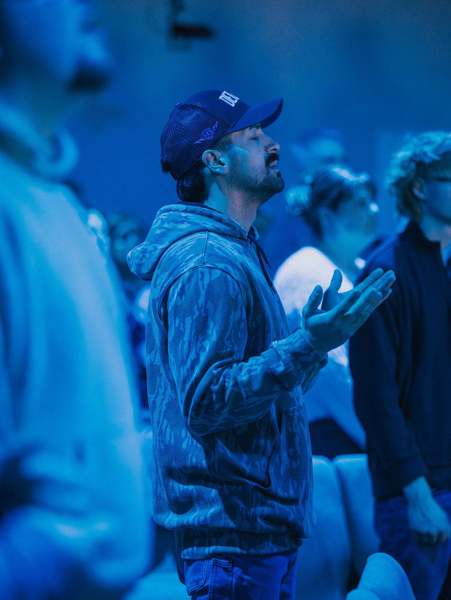 A person worshipping during a New Life Church Sunday service
