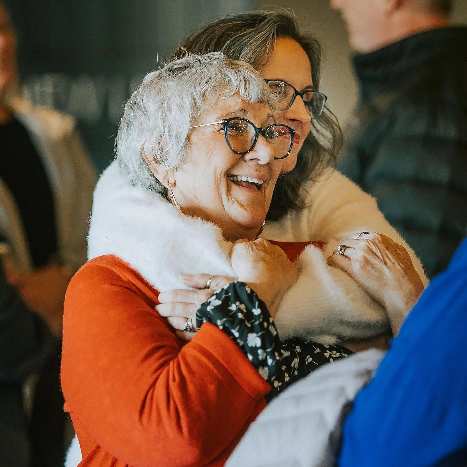 Two women connecting during a New Life Church gathering in Wayland, MI.
