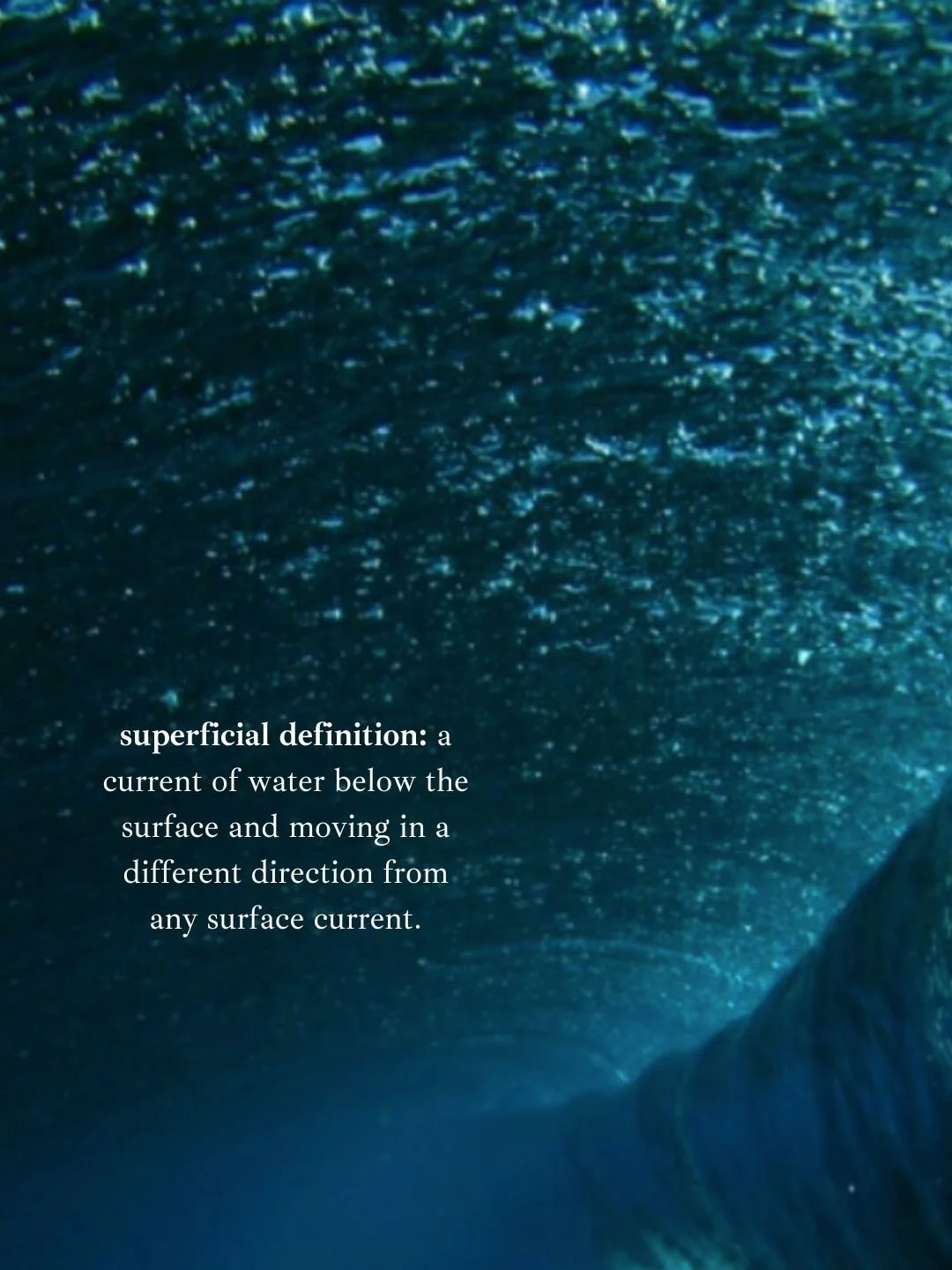 Close-up of water with surface currents and bubbles, with overlay text defining a surface current as a water flow beneath the surface moving in a different direction.