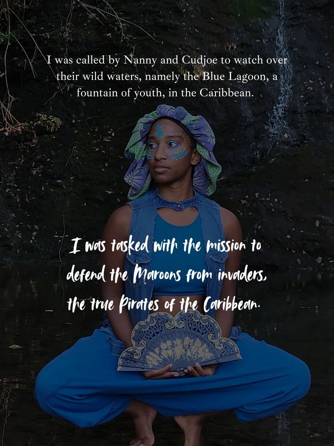 Mermaid Warrior Andrina seated cross-legged in front of a waterfall, holding a decorative fan, with overlaid text about her mission to protect the Blue Lagoon and defend the Maroons from invaders in the Caribbean.