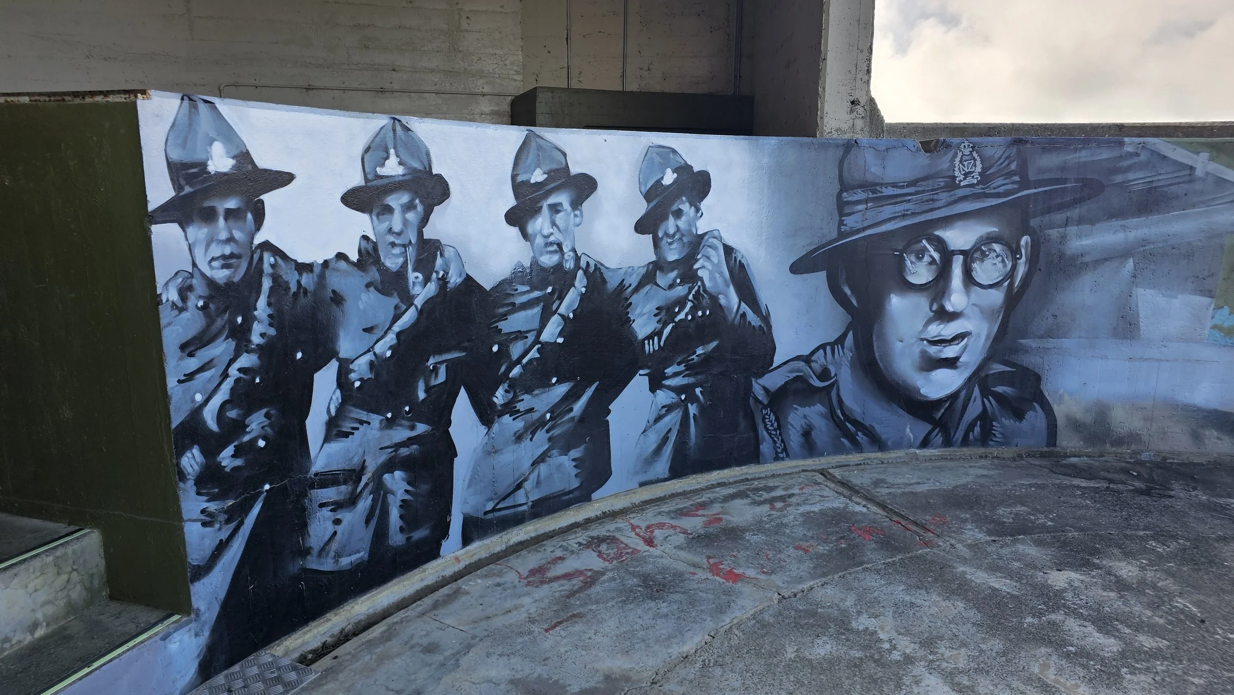 Historic gun position and mural at Godley Head