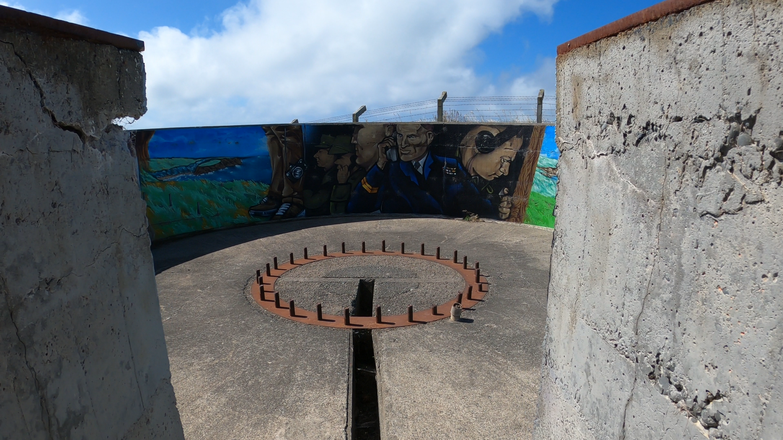 Historic defence structure and artwork at Godley Head
