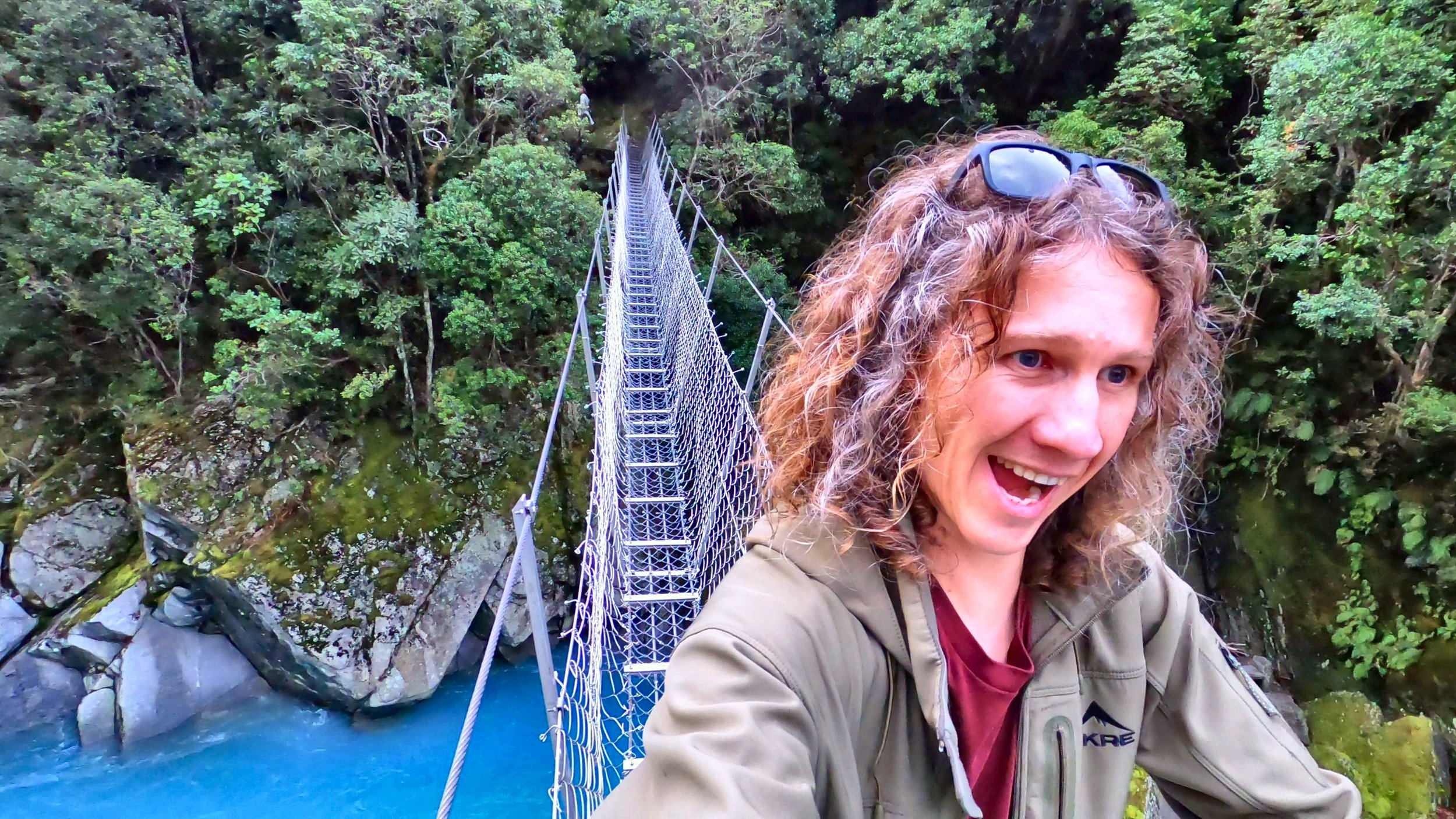 Brad crossing the Cesspool Swing Bridge over the Arahura River