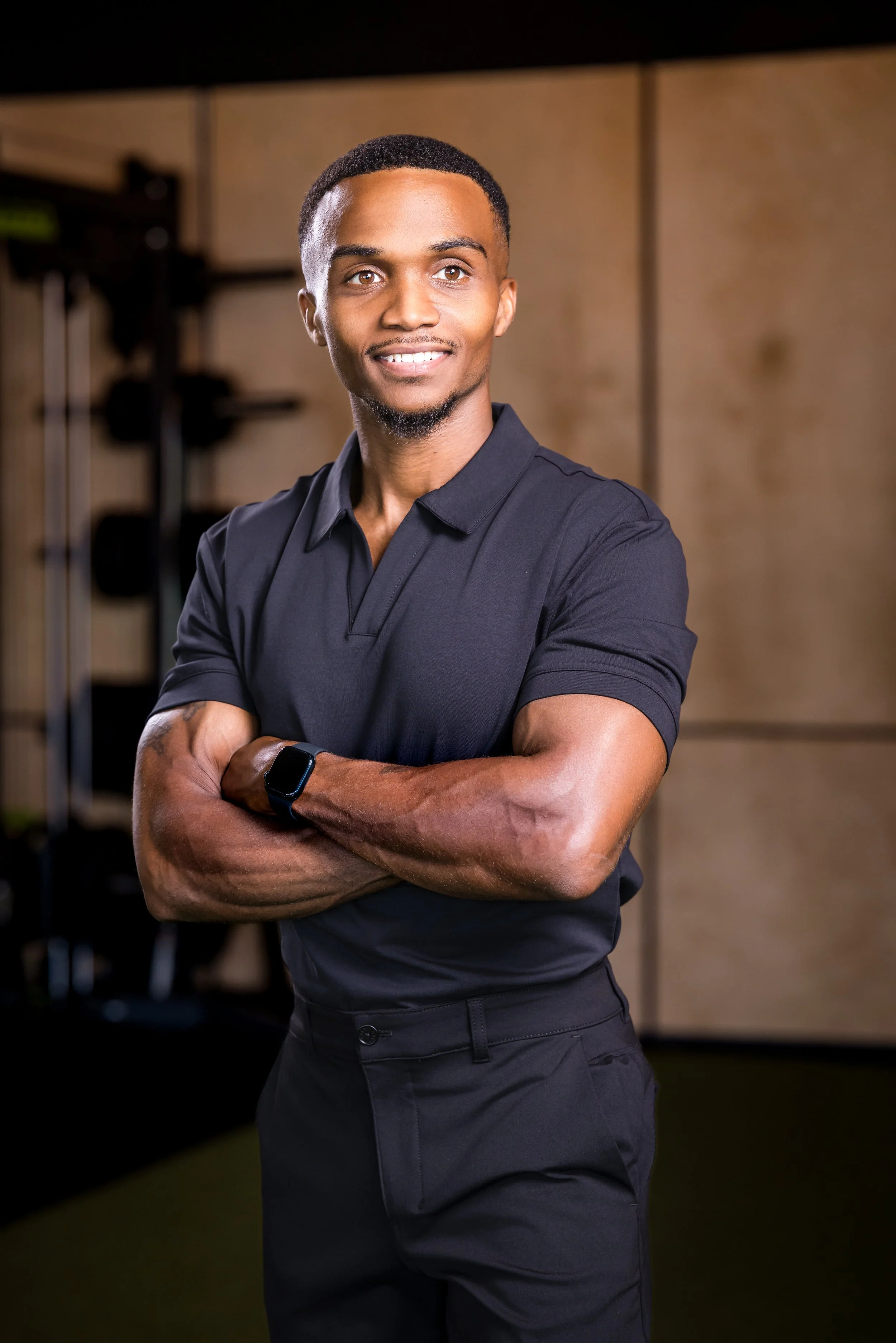 Chris Taylor smiling in a private fitness studio.