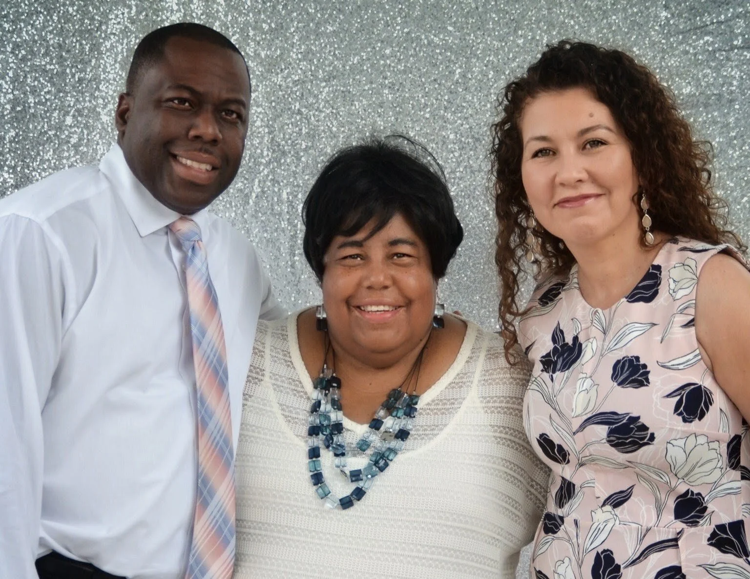 Christopher Bradford with his mother and wife.