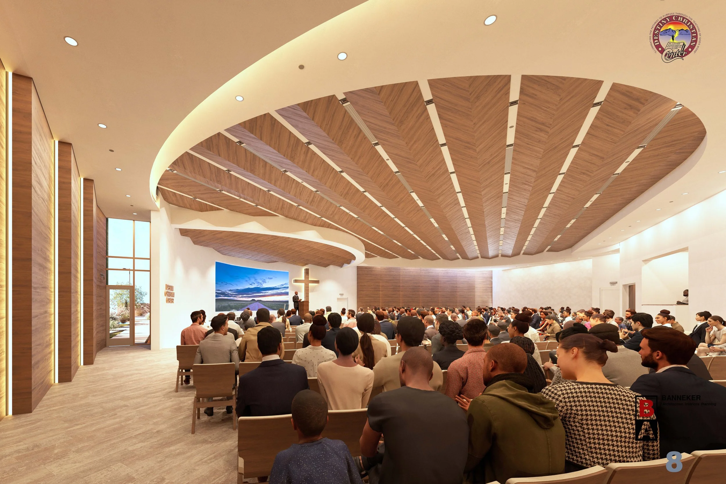 Interior of a modern church or conference hall filled with a large audience seated in rows facing a stage. The stage has a cross and a large screen showing a landscape scene. The ceiling has artistic wooden panels and is illuminated with recessed lig