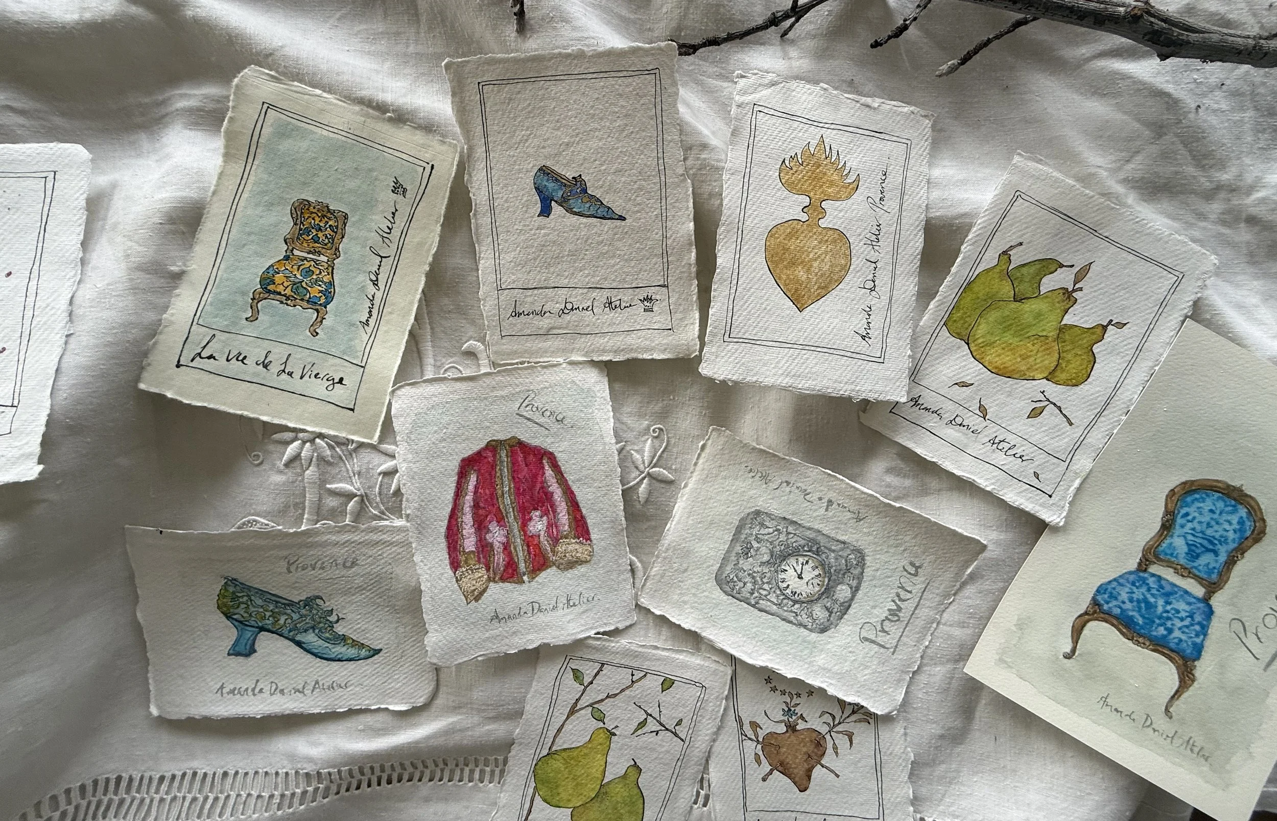 Collection of vintage-style Provence original illustrated cards featuring furniture, fashion, and nature scenes on torn paper with handwritten labels.